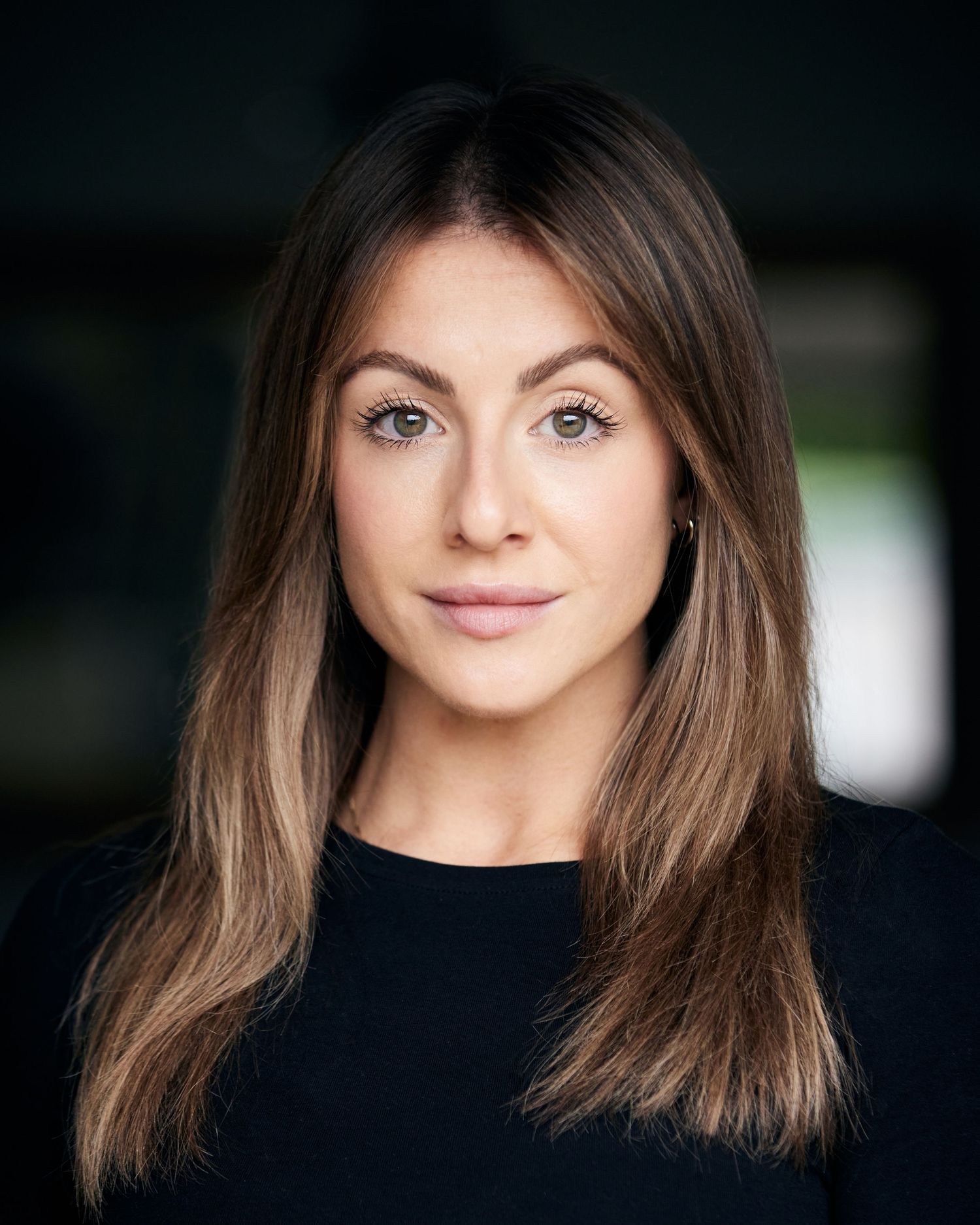 Cardiff-based actor; cool and modern in natural light setting.
