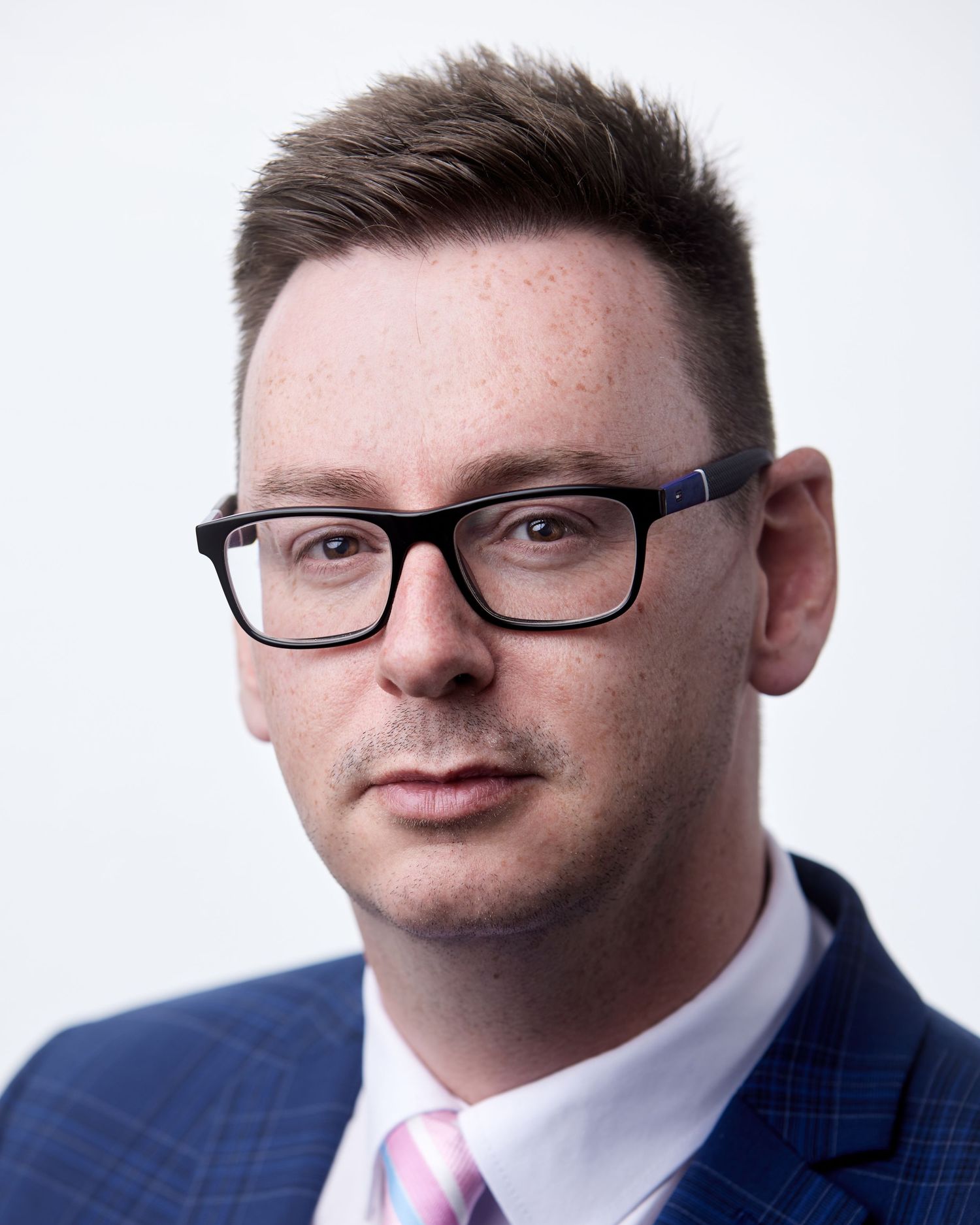 Classic white background for a professional corporate headshot in Cardiff.