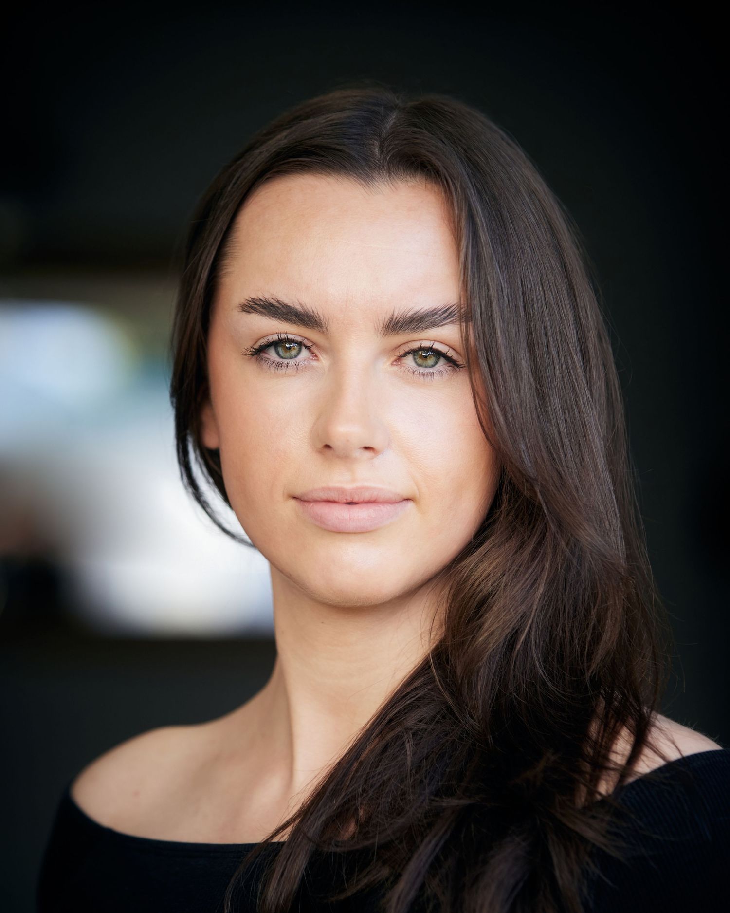 Commanding natural light portrait; focused energy in Cardiff daylight by Geraint Todd.
