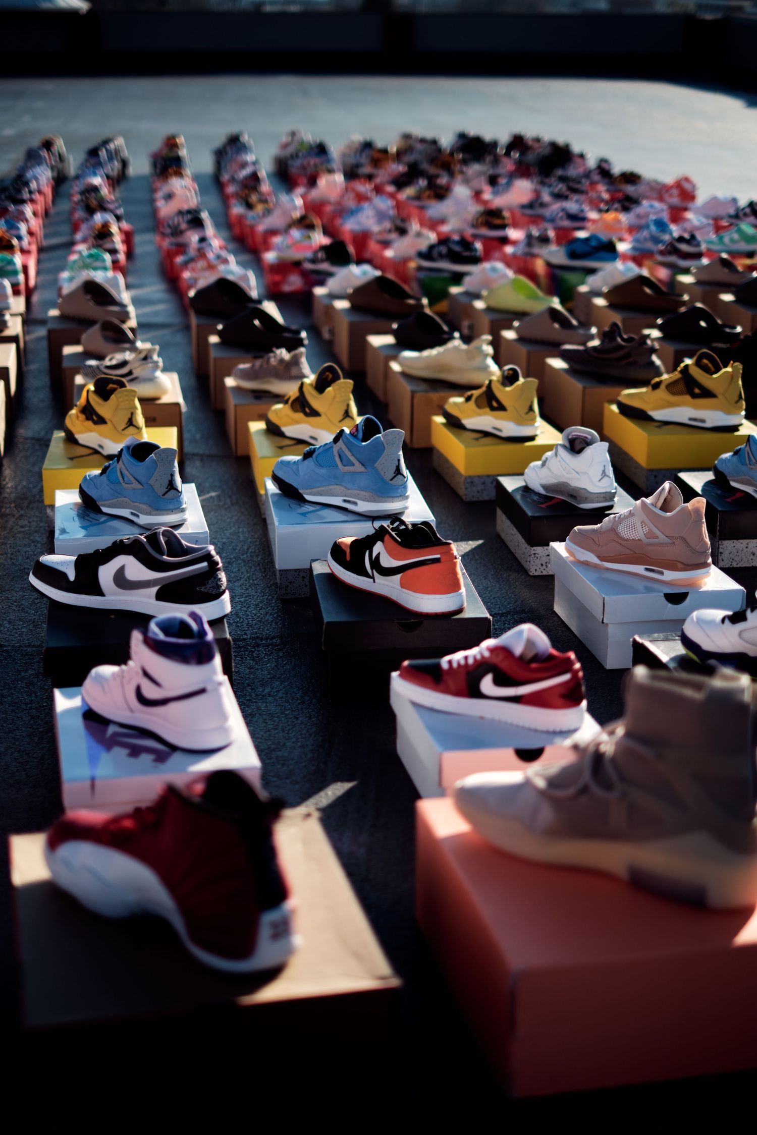 Rows of colorful Nike sneakers arranged in a detailed display.