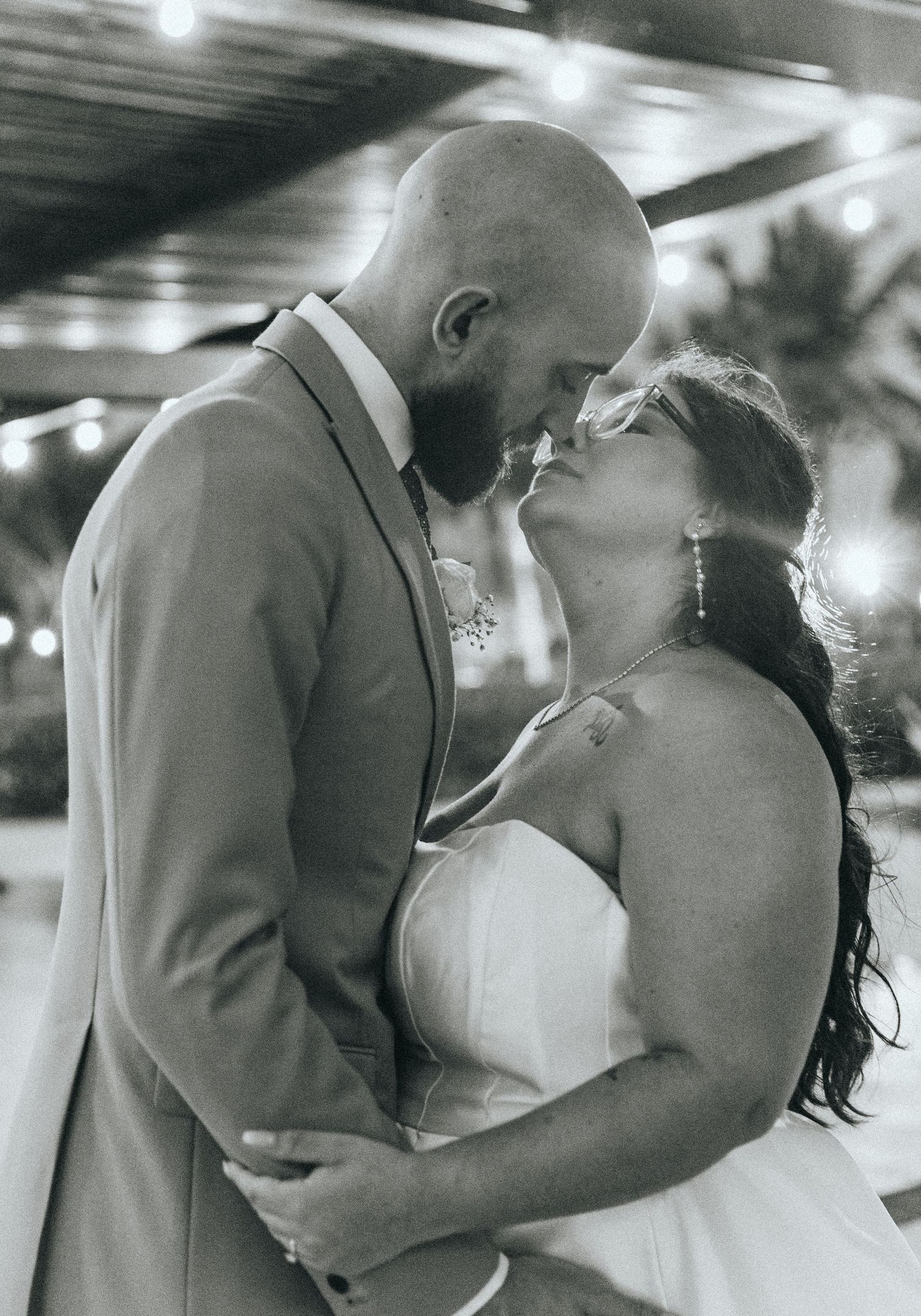 Artistic black and white series of romantic wedding moments.