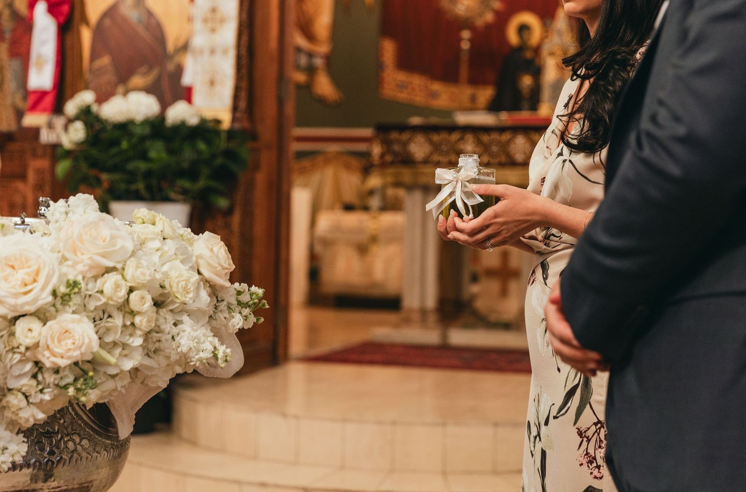 White floral arrangements and decorative elements at an elegant event.