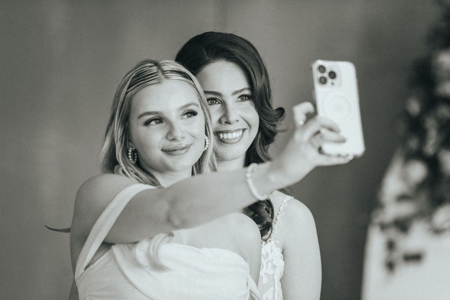 Candid celebration moments captured in black and white photography.