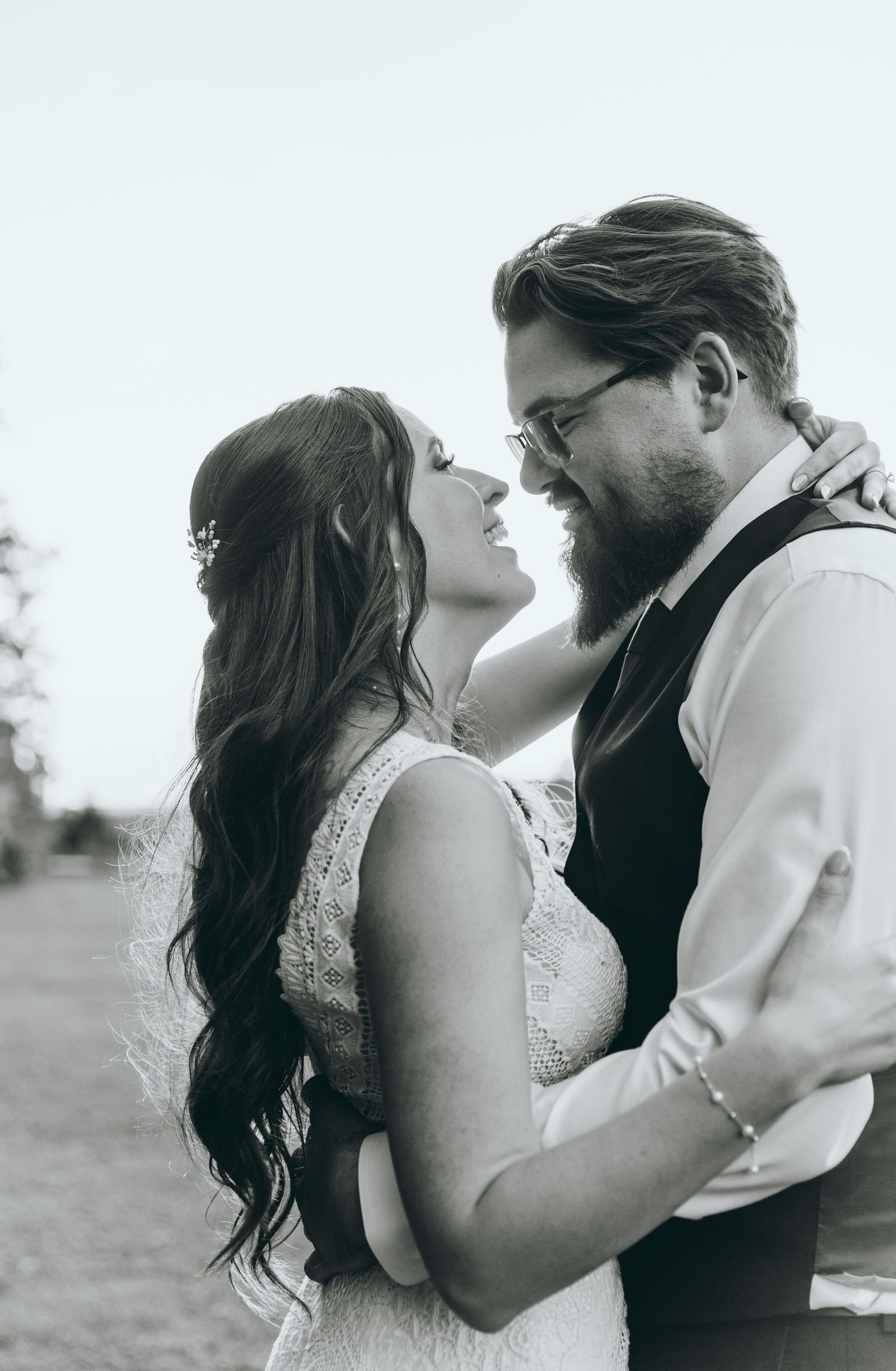 A romantic black and white portrait captured during an intimate moment.
