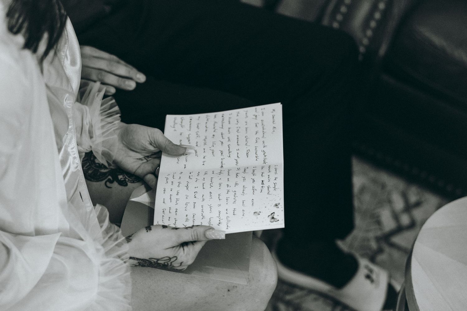 Handwritten notes and letters captured in black and white photography.