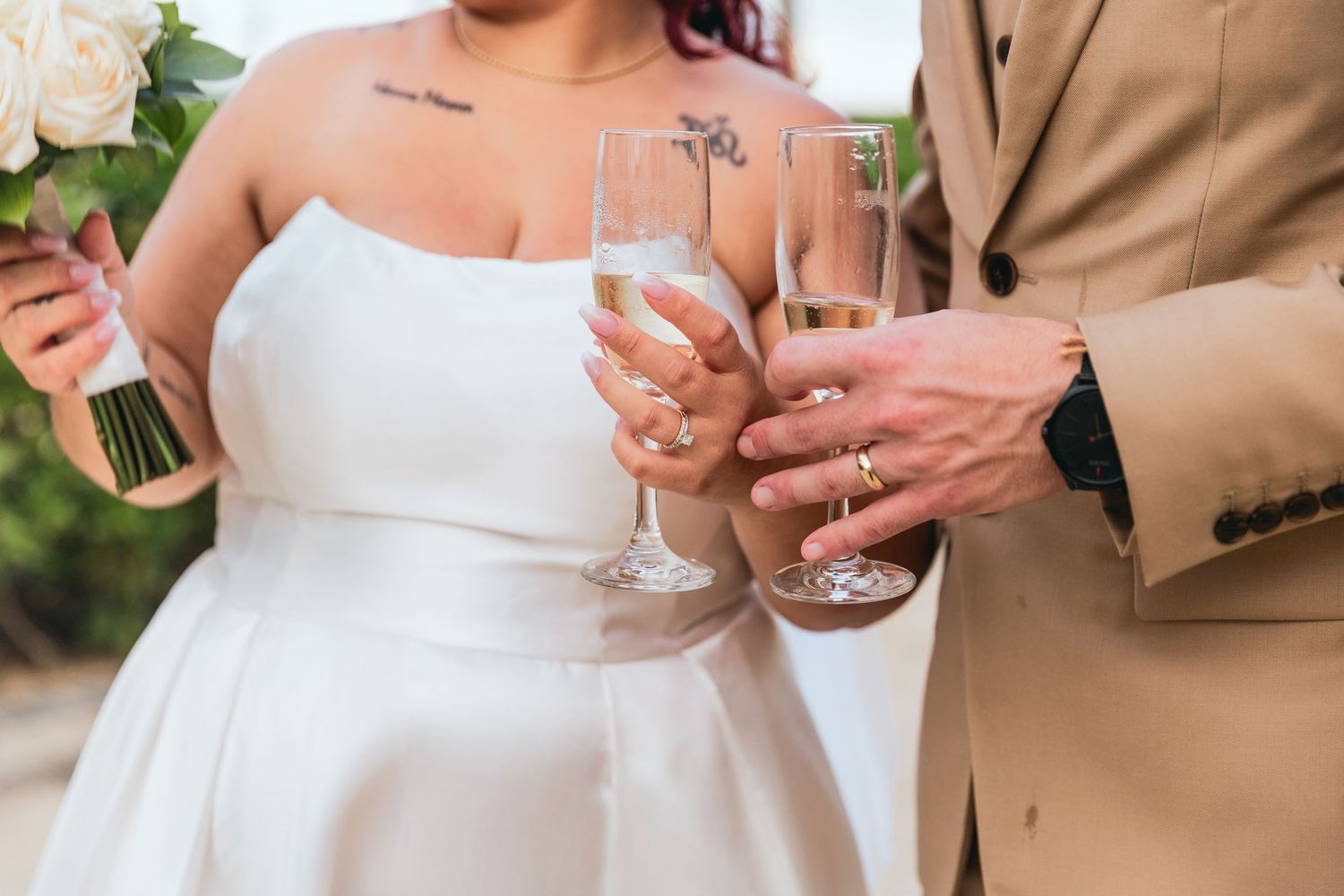Wedding celebration details showing champagne toasts and formal attire.
