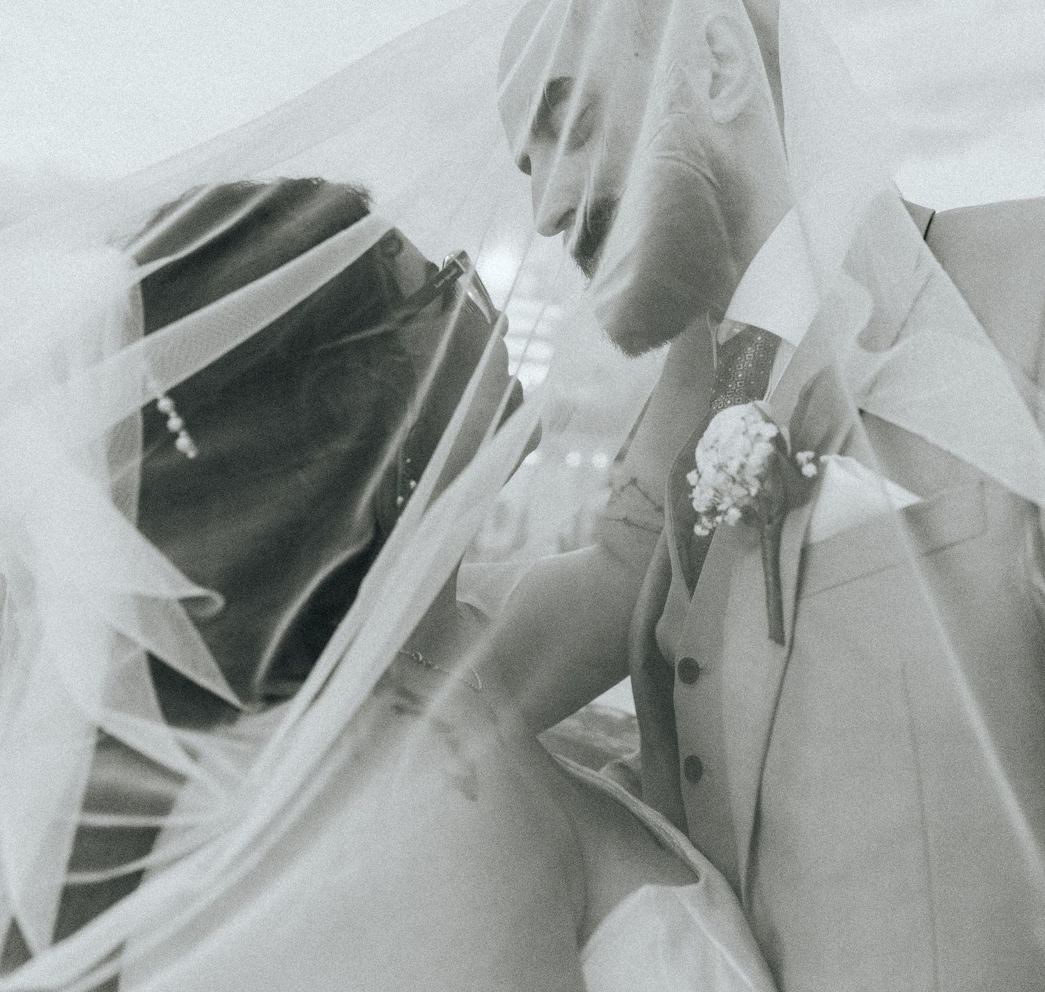 Abstract black and white details of wedding attire and moments.
