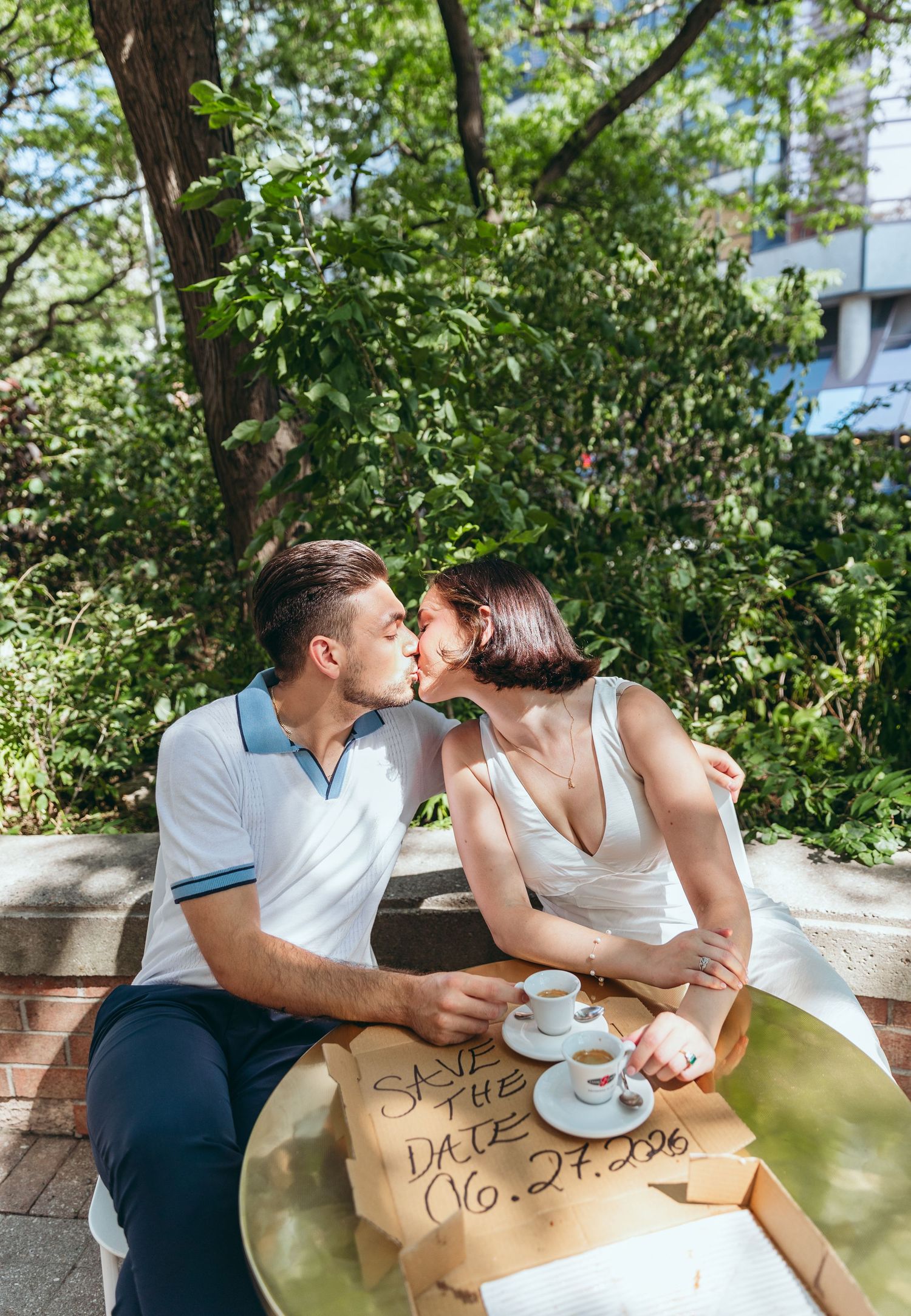A romantic coffee date scene with a couple sharing intimate moments at an outdoor cafe.