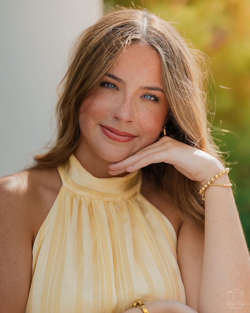 Close-up portraits showing natural makeup and yellow sleeveless top.