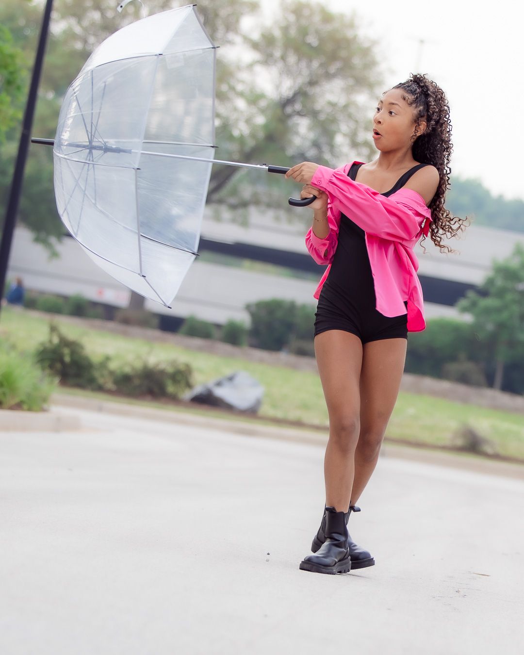 Outdoor fashion portrait with a clear umbrella, Oak Brook