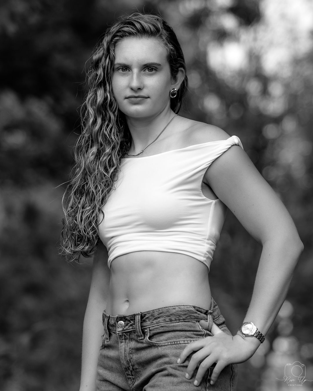 Black and white portrait series featuring summer casual wear and natural lighting.