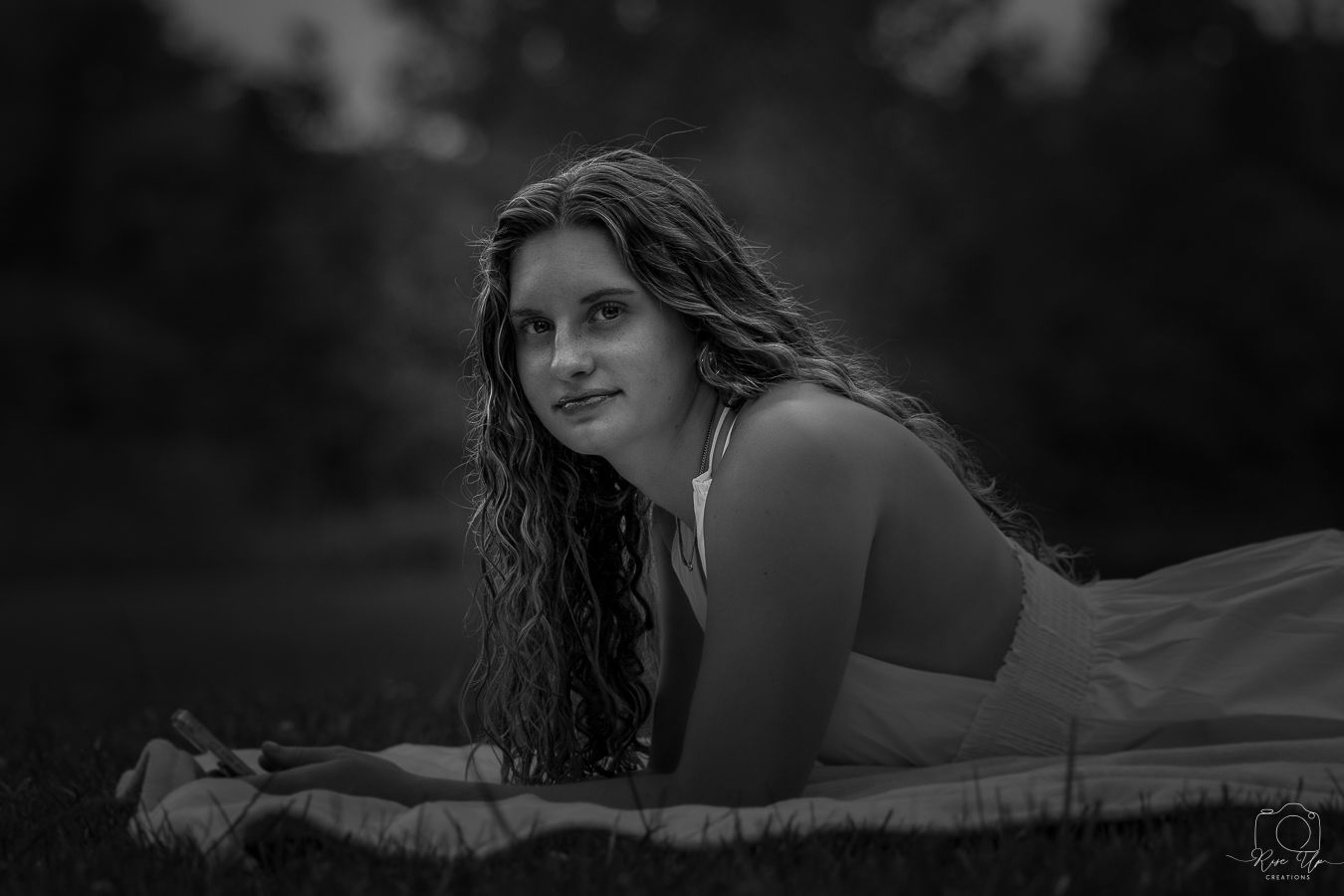 Artistic black and white portrait series with dramatic lighting and poses.