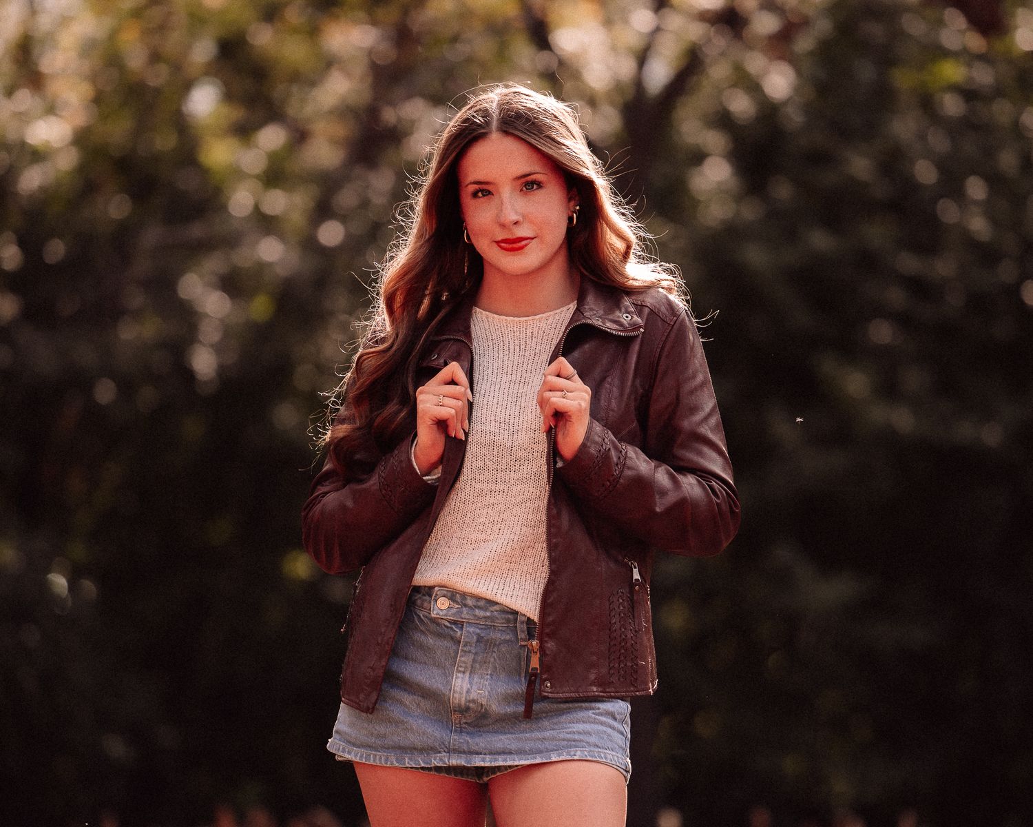 A series of outdoor portraits showing someone in a brown jacket and light top.