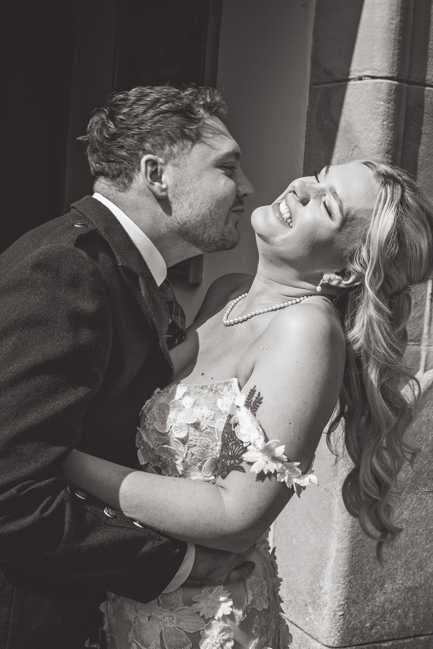 Romantic black and white wedding photo sequence showing an intimate moment.