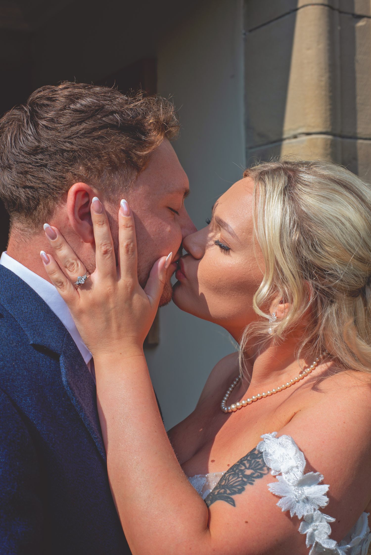 Close-up shots of romantic wedding moments with lace dress details.