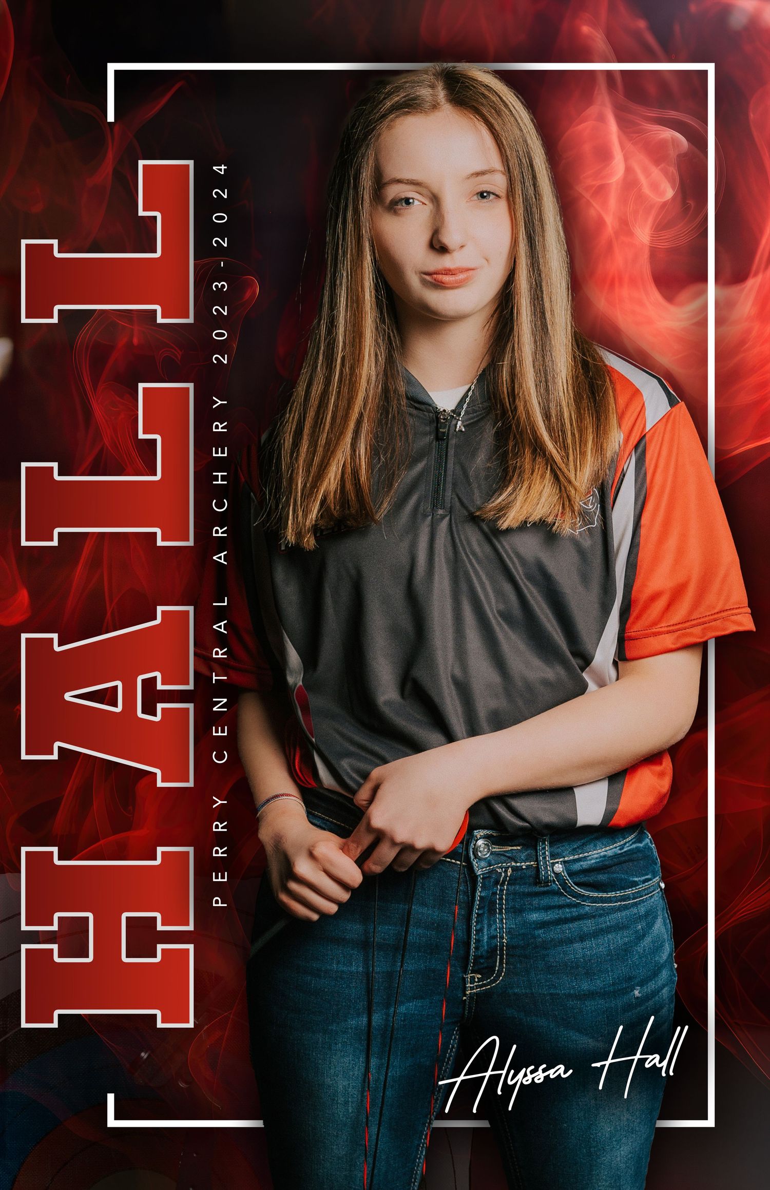 Student athlete poses in dramatic red smoke effect wearing varsity jacket for sports portrait.