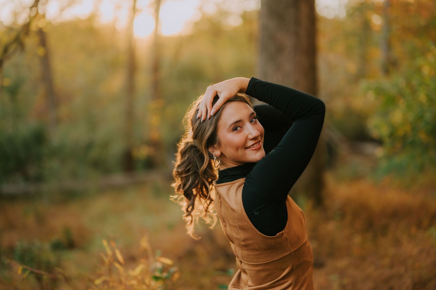 Candid outdoor portrait series with autumn colors in background.