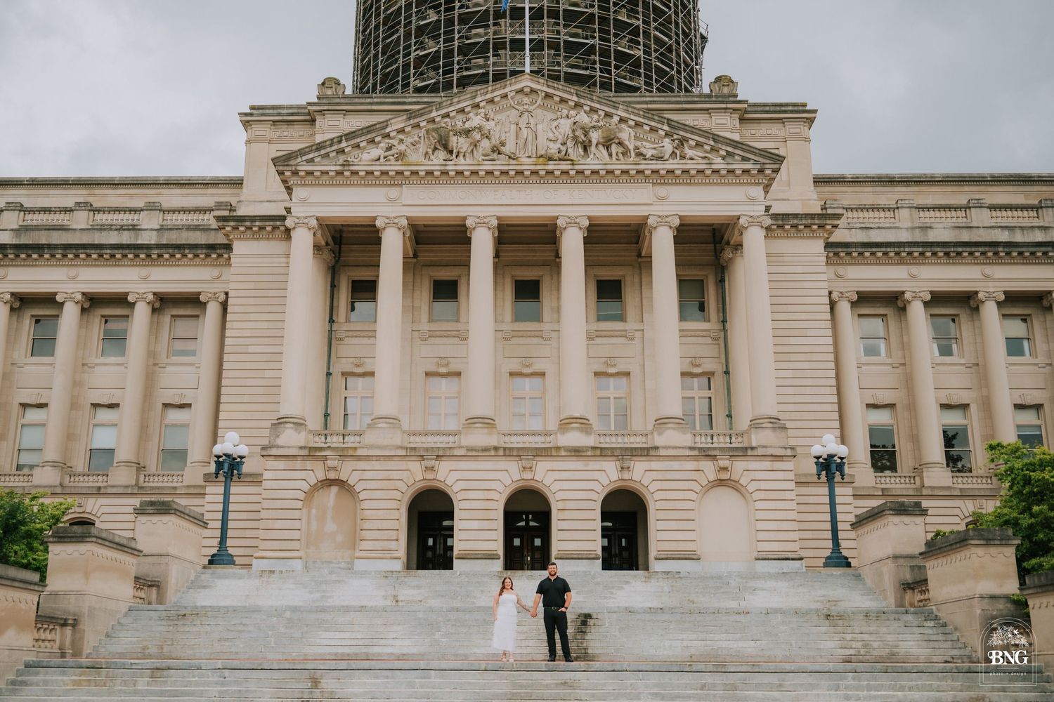 A grand neoclassical government building with columns and ornate architectural details.