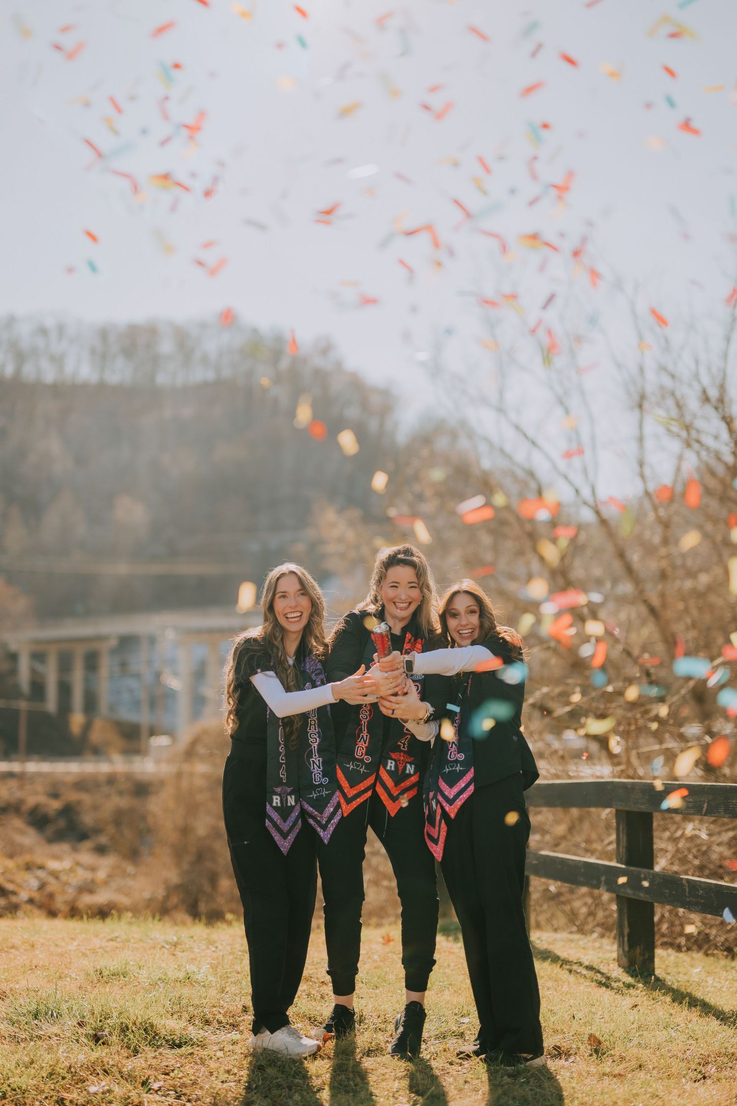 A celebratory moment with confetti flying in the autumn air.