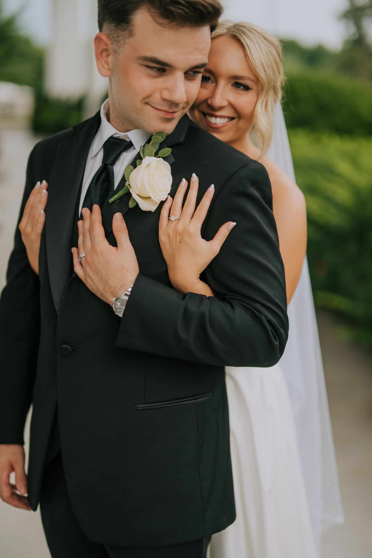 Intimate wedding portraits showing close embraces and romantic moments.