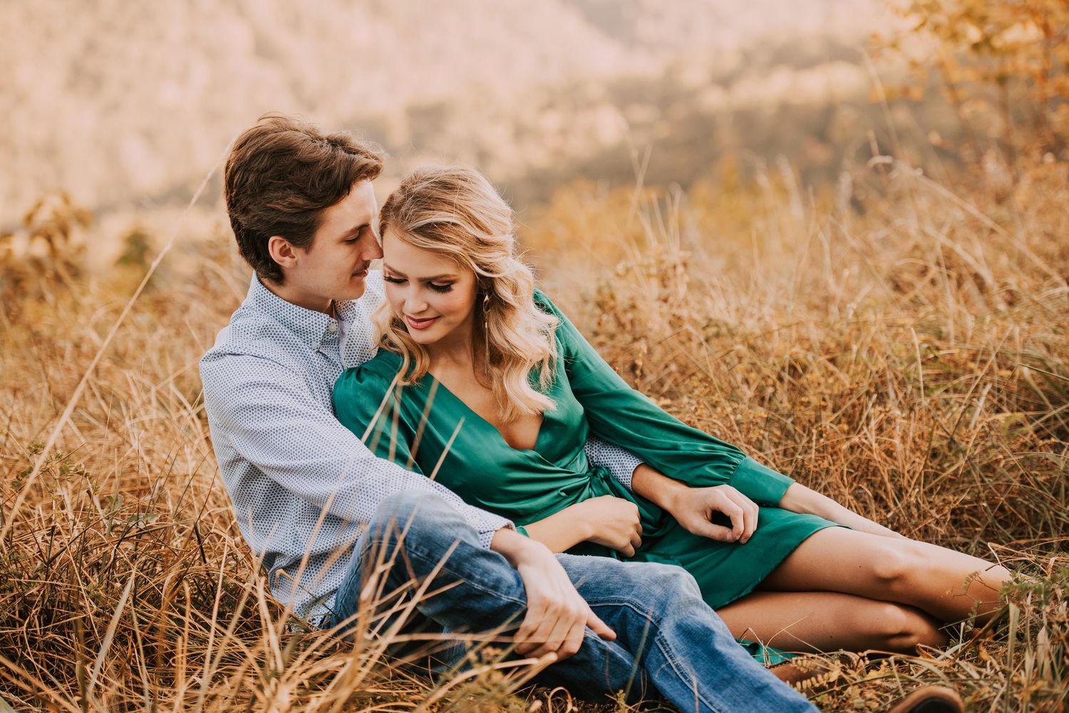 Candid couple photos in golden field during sunset with natural lighting.