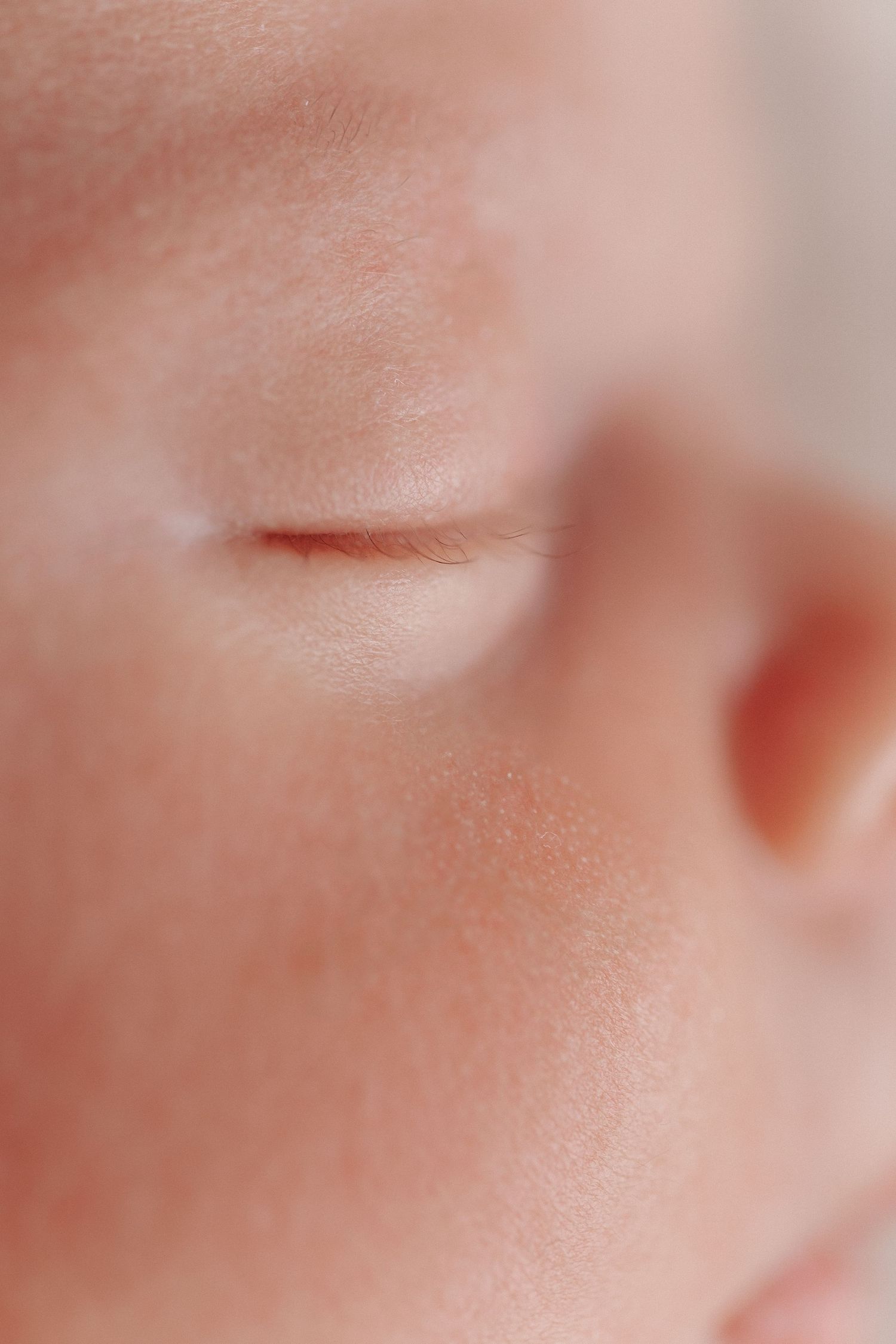 Close-up macro photograph showing skin texture and pores in extreme detail.