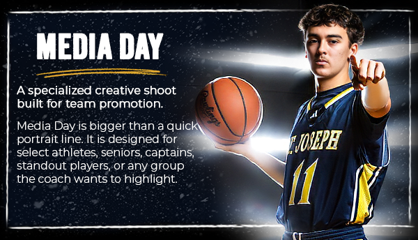 Basketball player in St. Joseph jersey pointing forward during Media Day team promotion shoot.