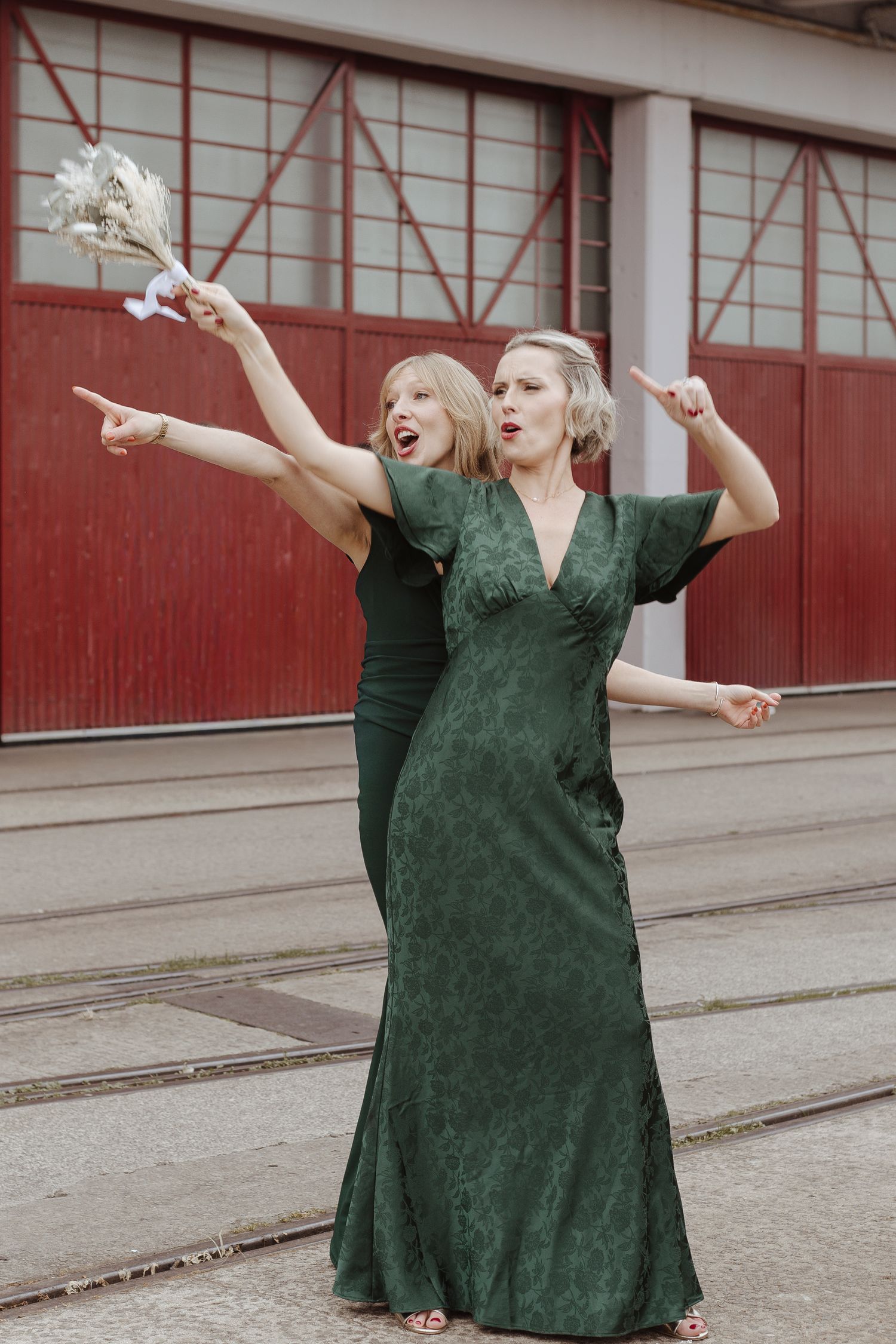 bridesmaids dancing outside of the m shed