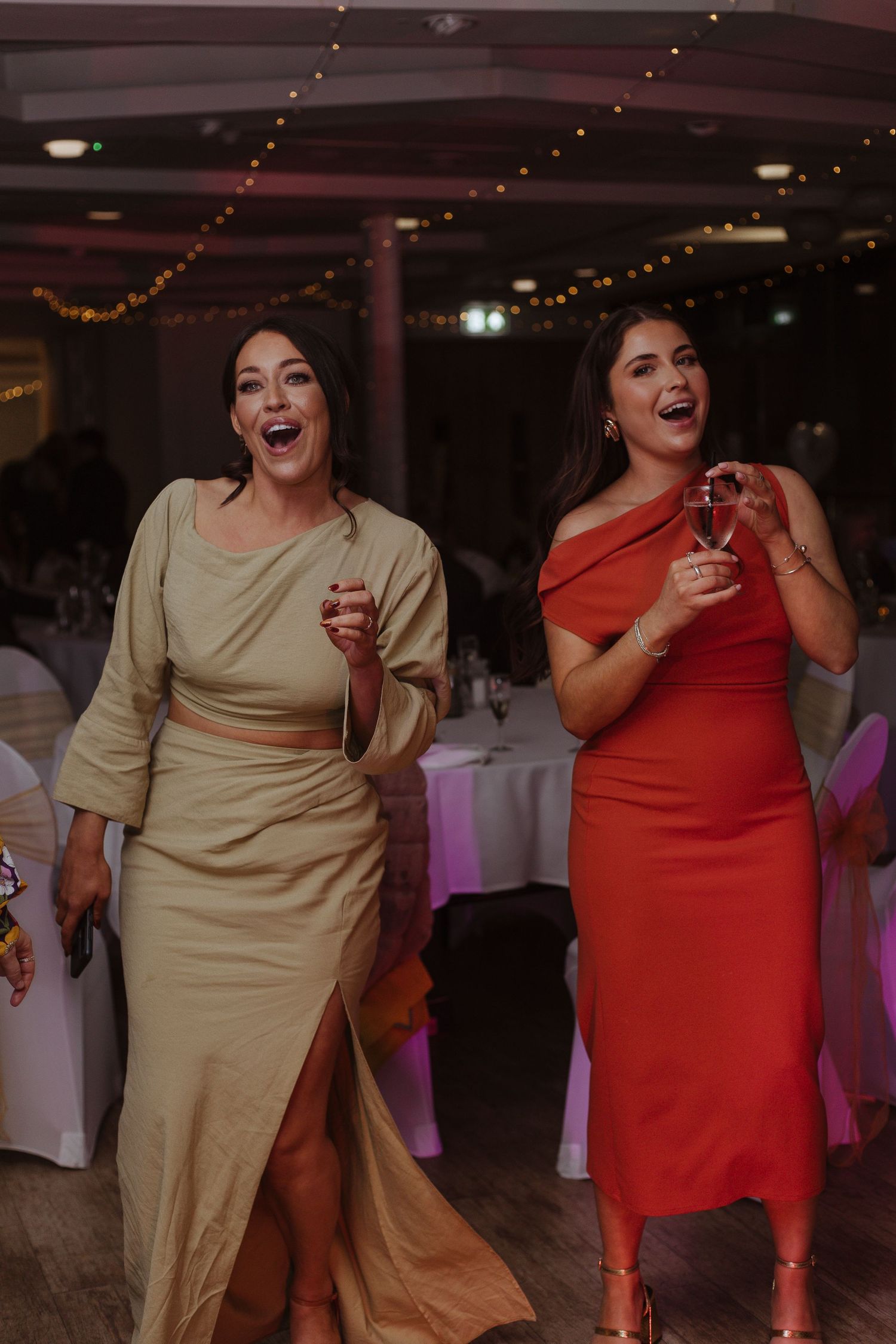 wedding guests dancing and smiling