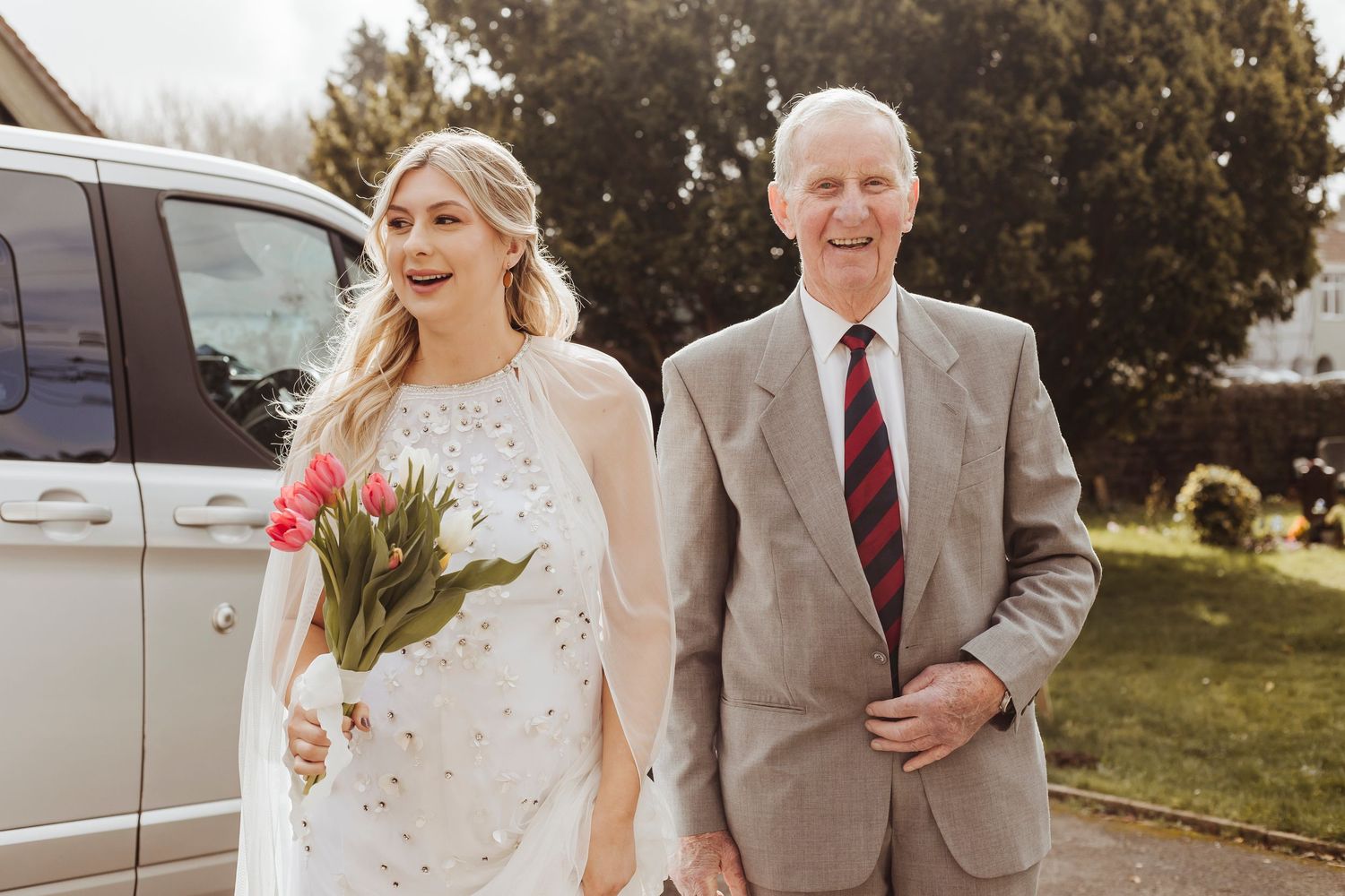 grandfather and granddaughter outside church