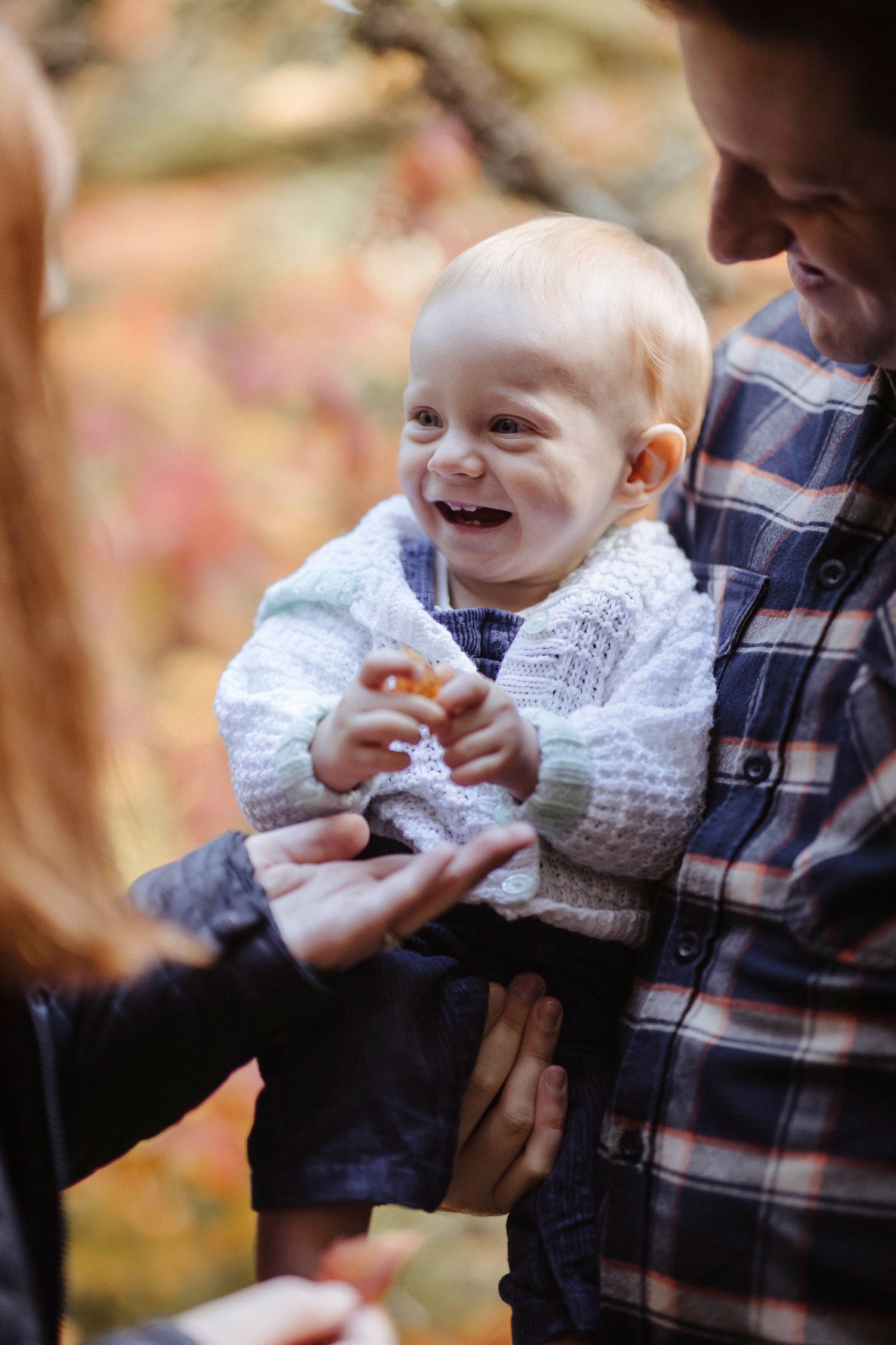 toddler laughing in his fathers eyes