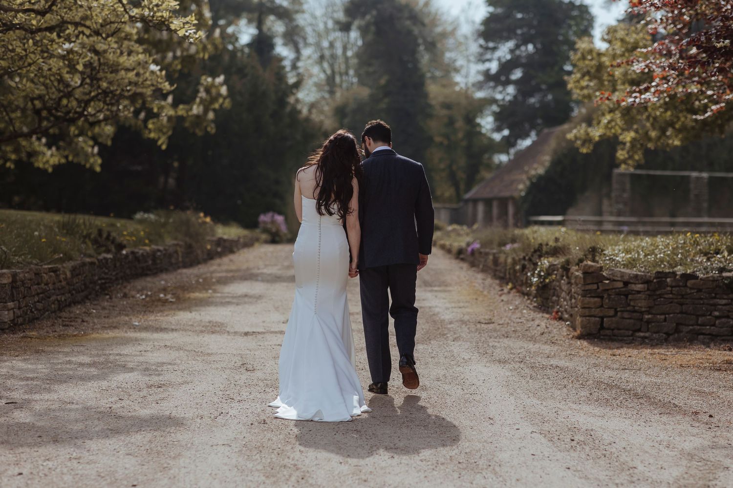 brand and groom staring out whilst their heads lean on each other