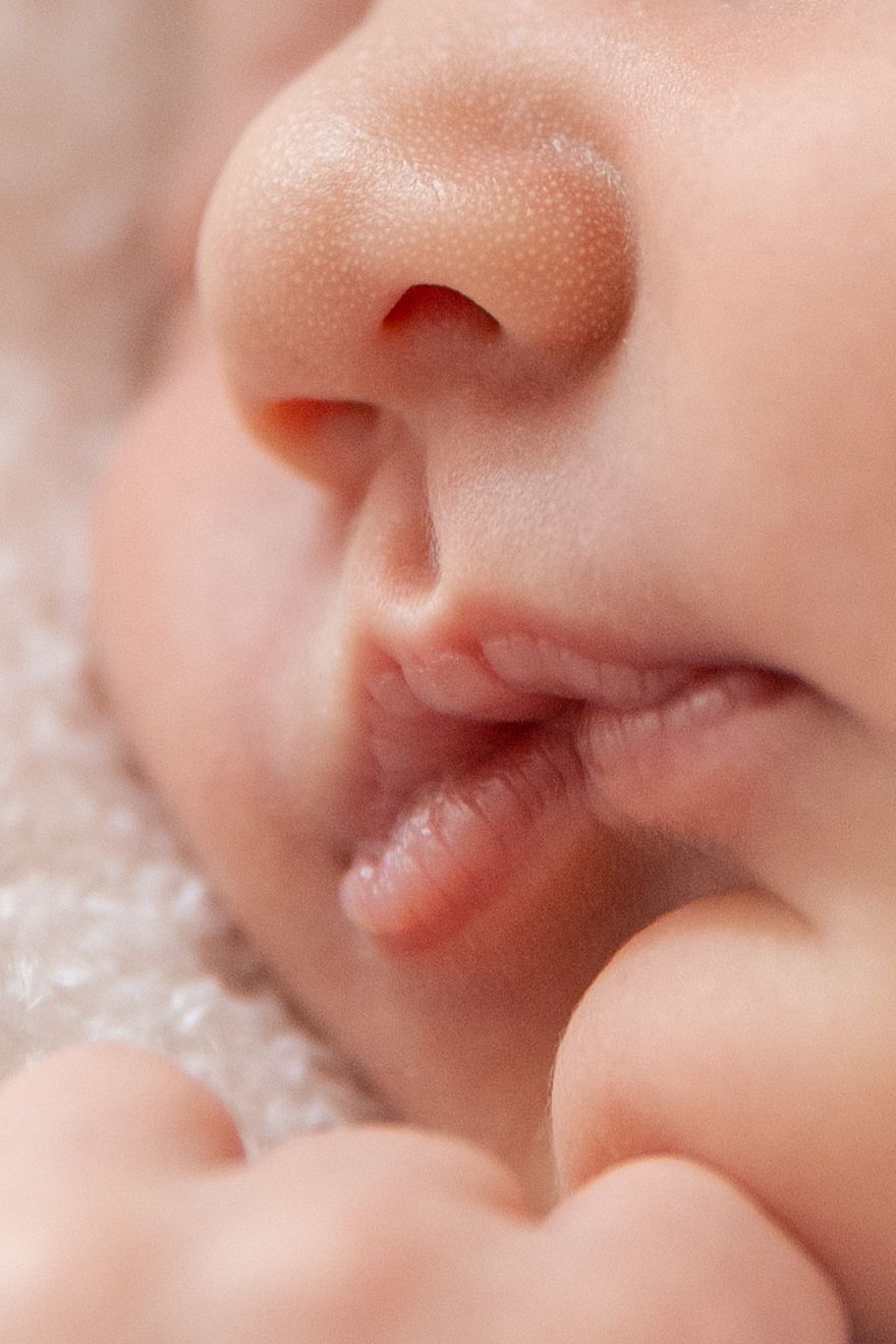 Close-up of newborn baby’s lips and nose
