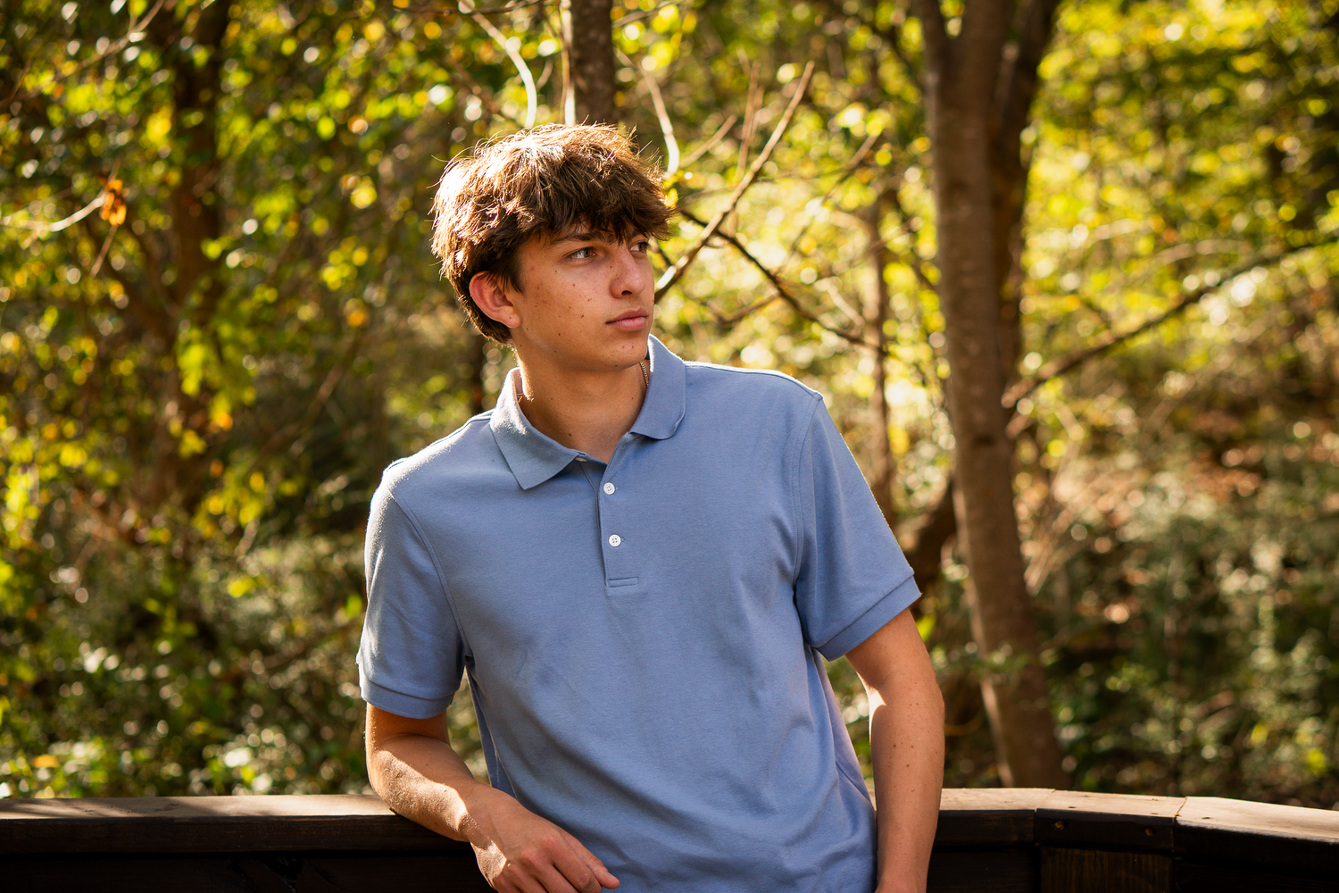 Outdoor photography session with warm autumn colors and natural lighting.