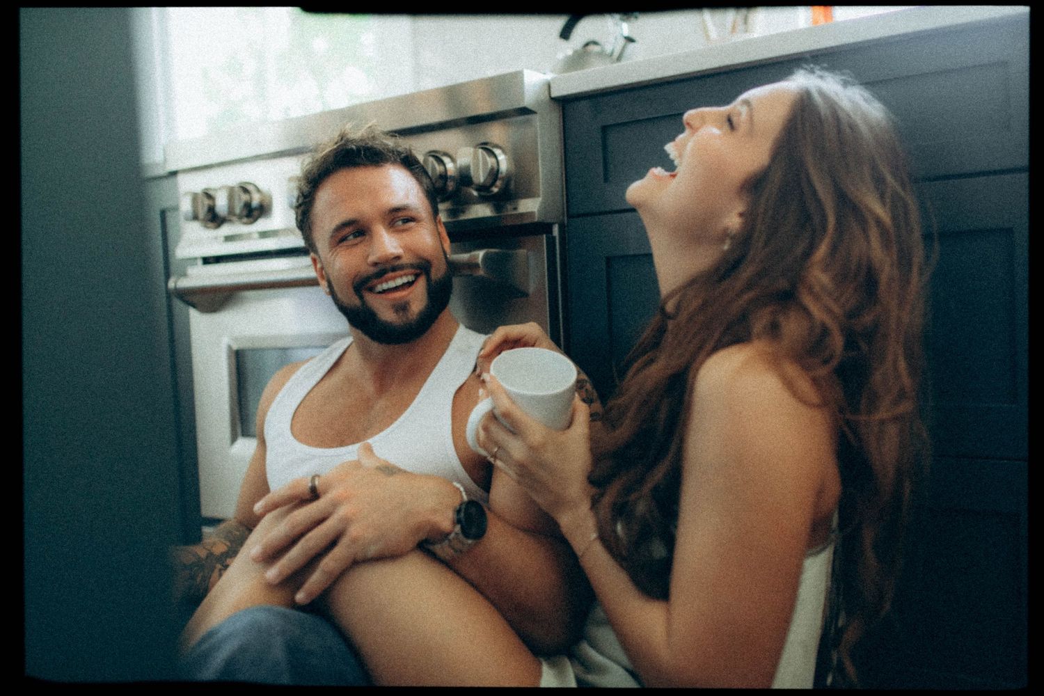Candid moments shared between two people in a dimly lit interior setting.