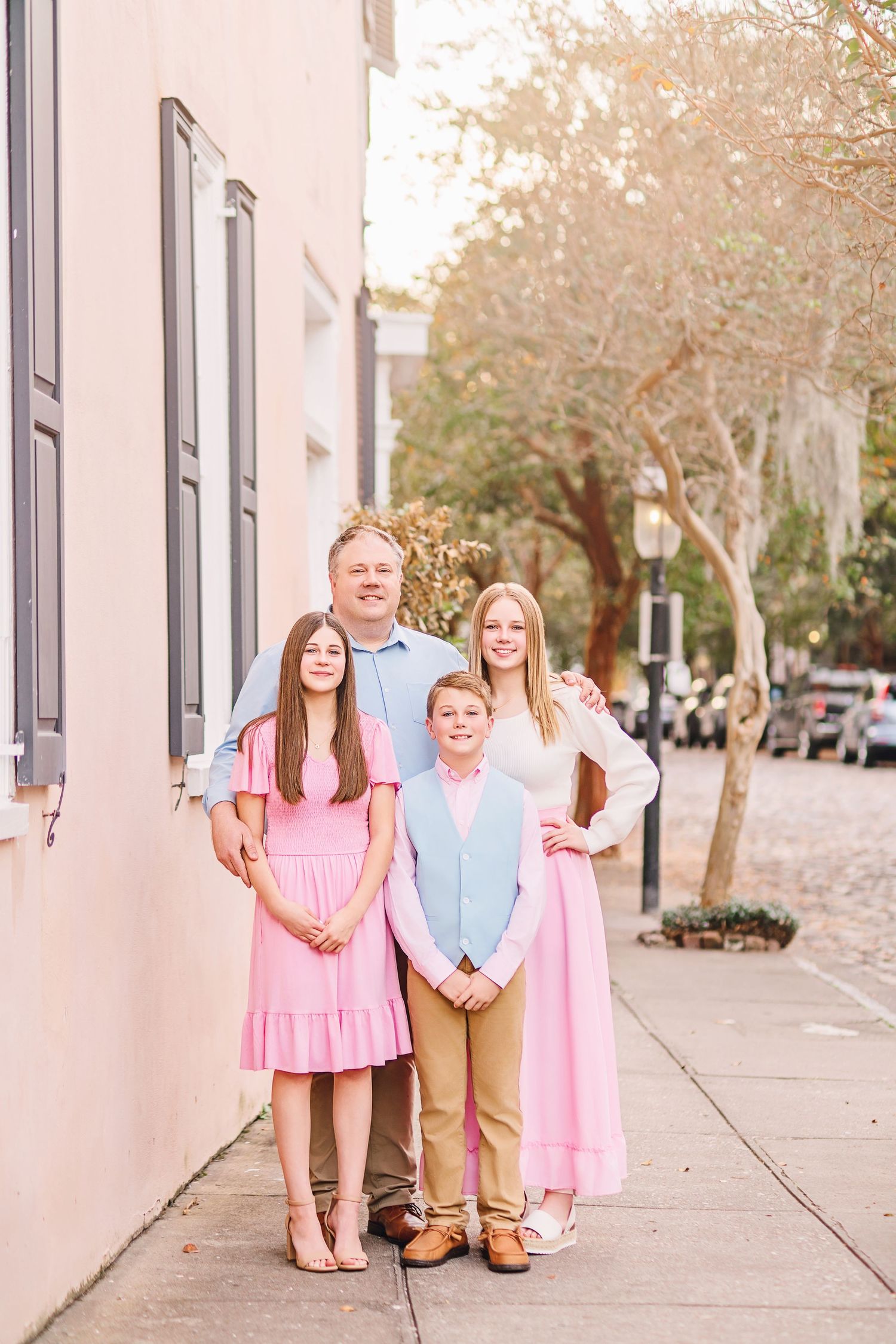 Family portrait session in Charleston South Carolina with parents and children, light-filled timeless heirloom photography