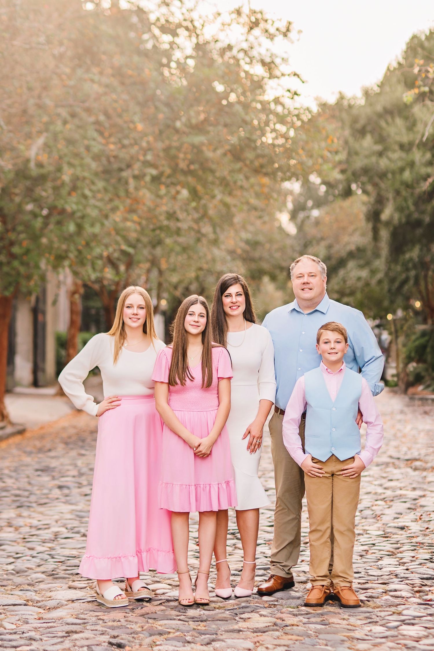 Family portrait session in Charleston South Carolina with parents and children, light-filled timeless heirloom photography