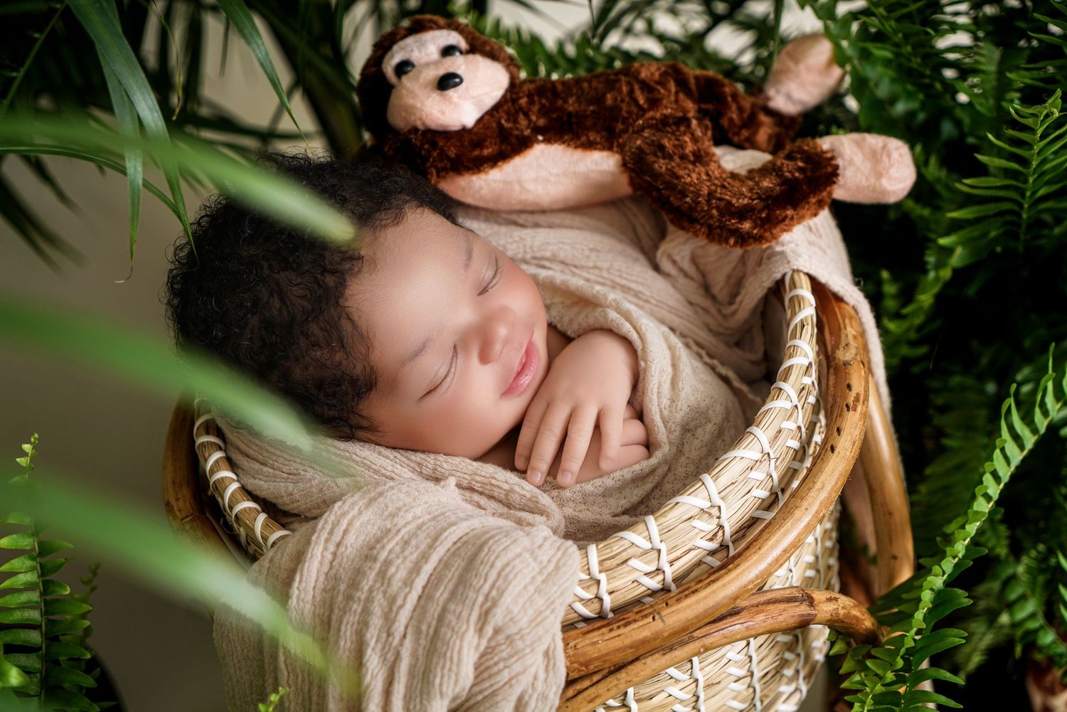 Newborn baby portrait in South Carolina, soft natural light, cozy wrapped infant photography, timeless heirloom style