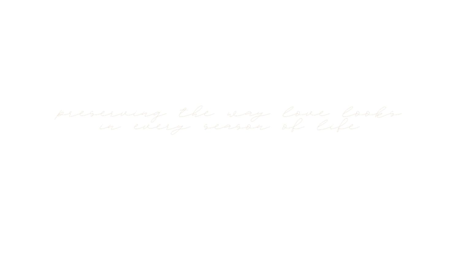 Faint light gray script text on a white background reading preserving the way time looks in every season of life.