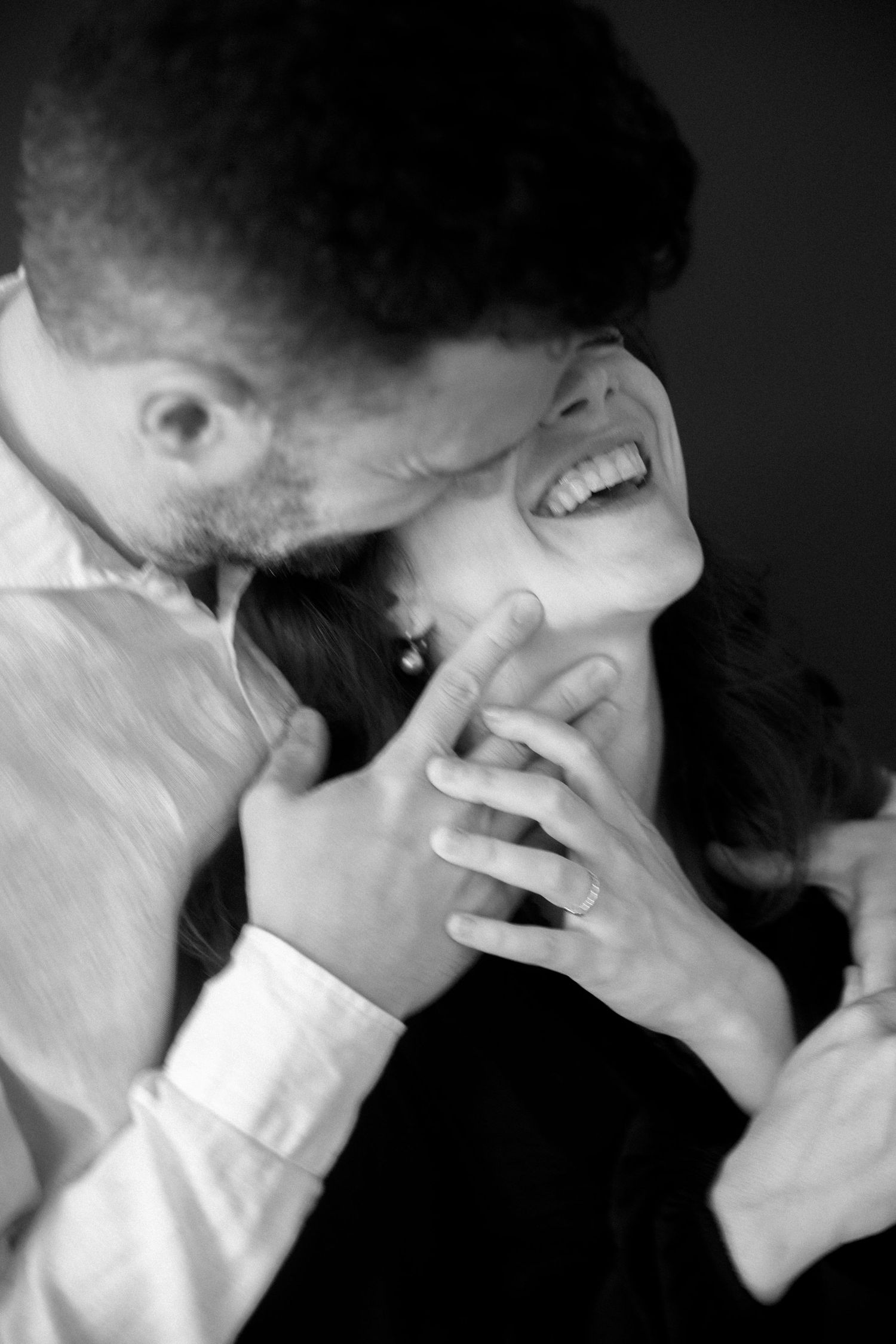 A series of black and white photos showing someone covering their face with their hand in despair or distress.