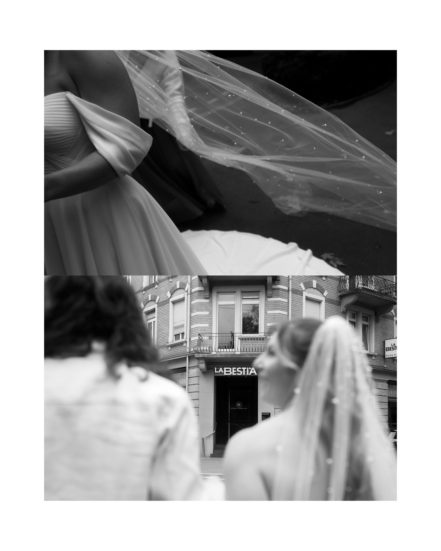Black and white wedding photograph showing a flowing veil and dress with a storefront building in the background. Swiss Wedding Photographer