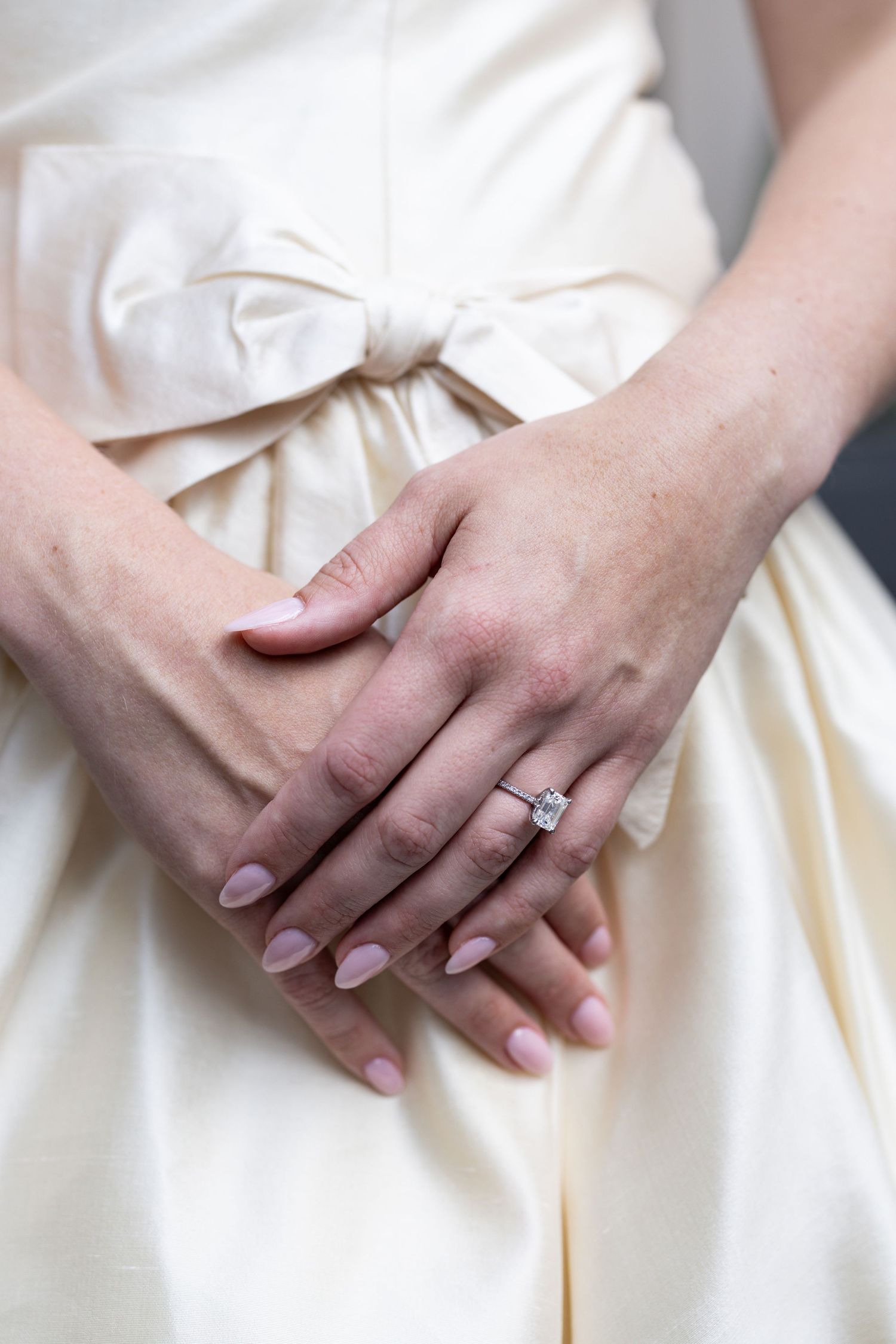 Elegant bride showing vintage engagement ring during rehearsal dinner at Waldorf Astoria Chicago photography by luxury wedding photographer.