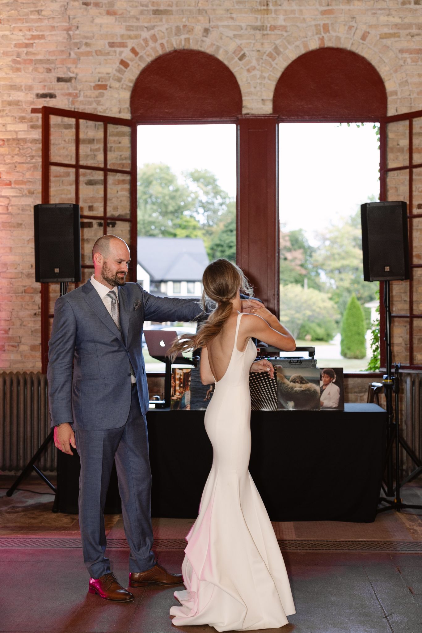 Luxury Chicago wedding photographer capturing authentic documentary and editorial first dance at iconic Michigan Italy theme venue location.