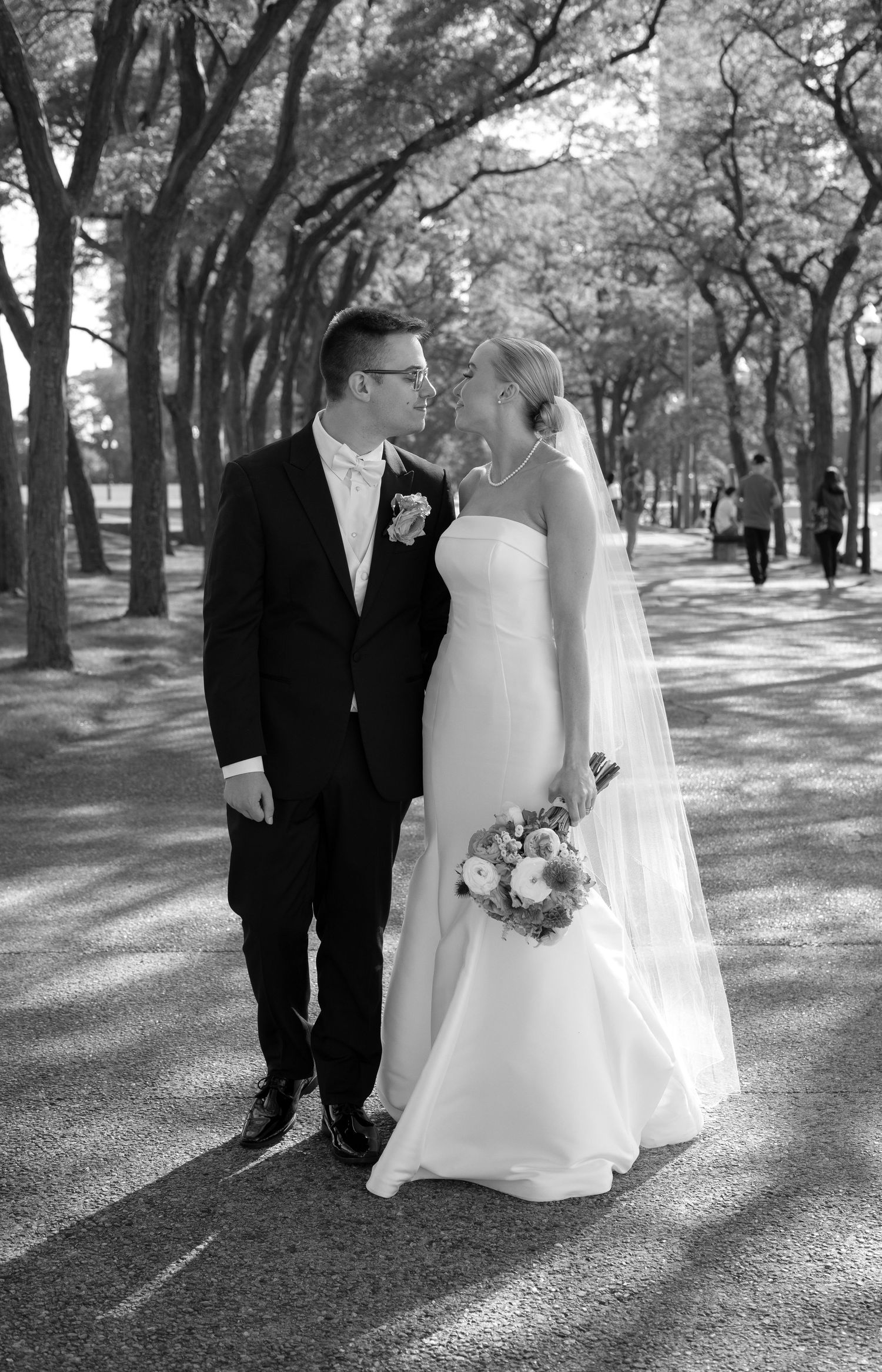 Bride and groom at iconic Milton Lee Olive Park in Chicago, captured by luxury Chicago wedding photographer in editorial documentary style.