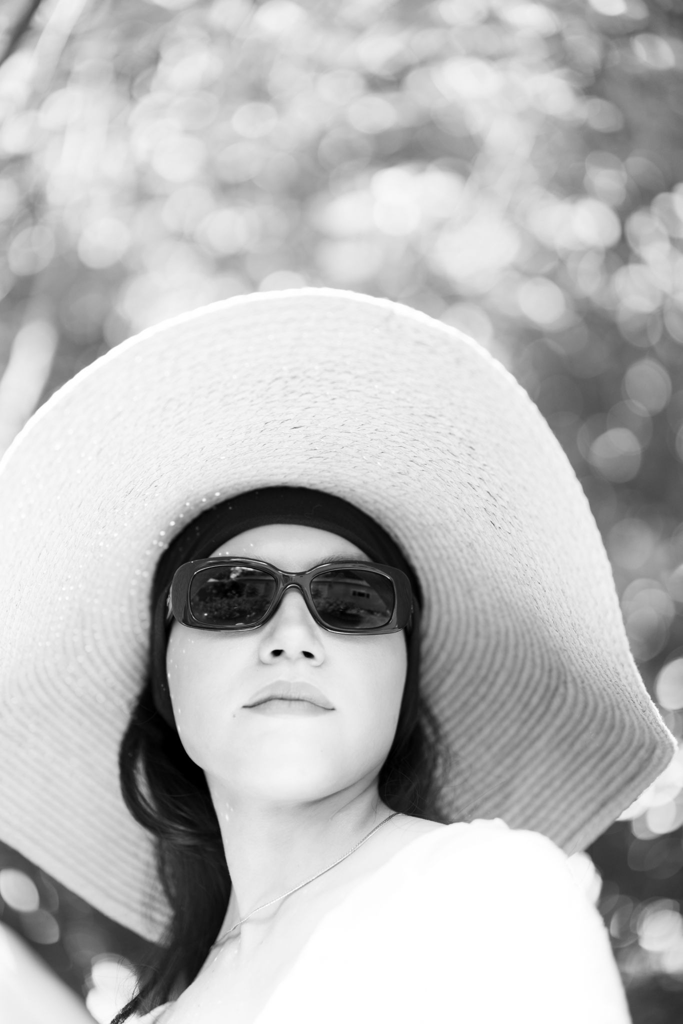 Fashion-forward portrait of Chicago and destination luxury photographer specializing in editorial and candid wedding photography.