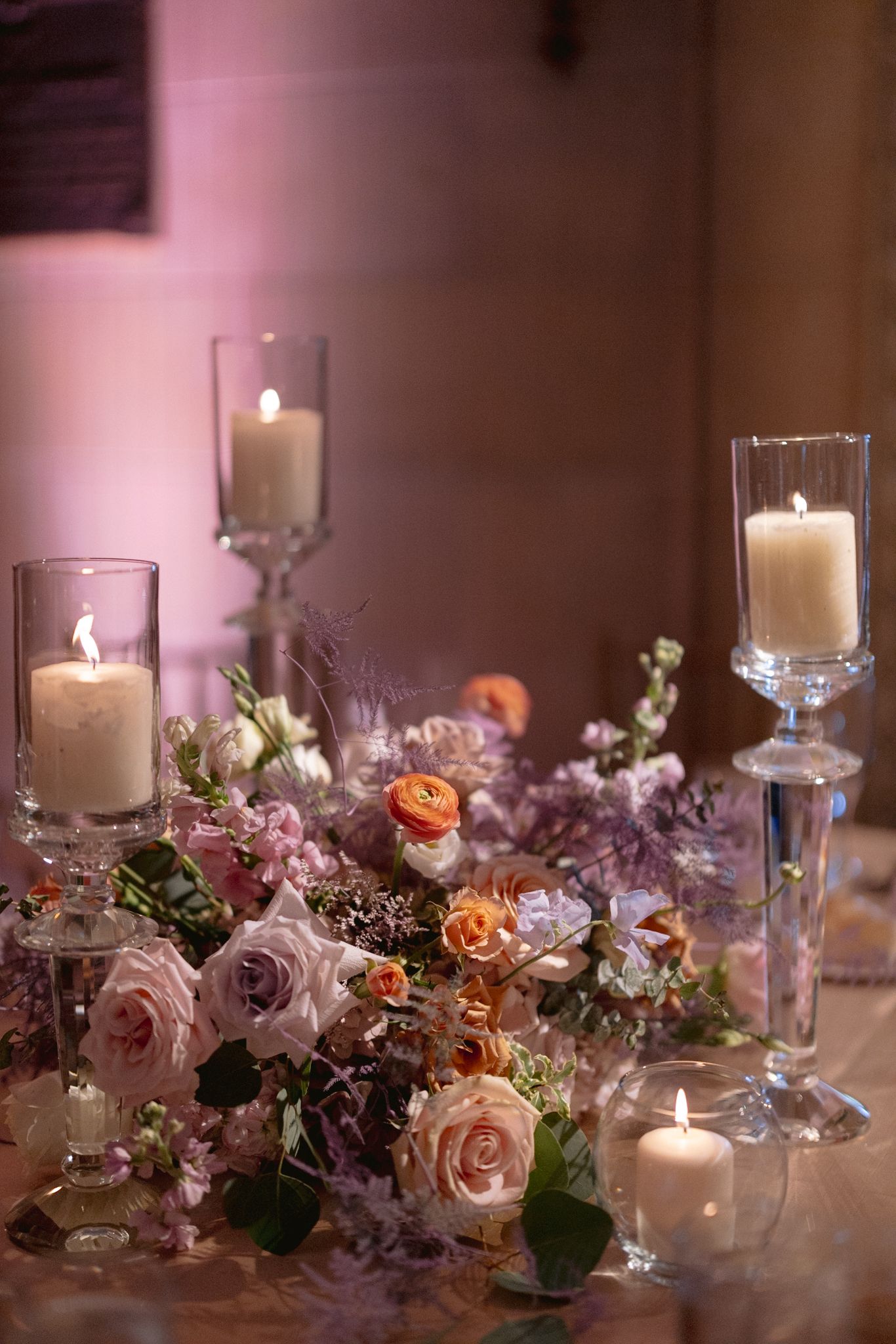 Fine art flowers and candlelight at Armour House Lake Forest captured by luxury Chicago wedding photographer in documentary editorial style.