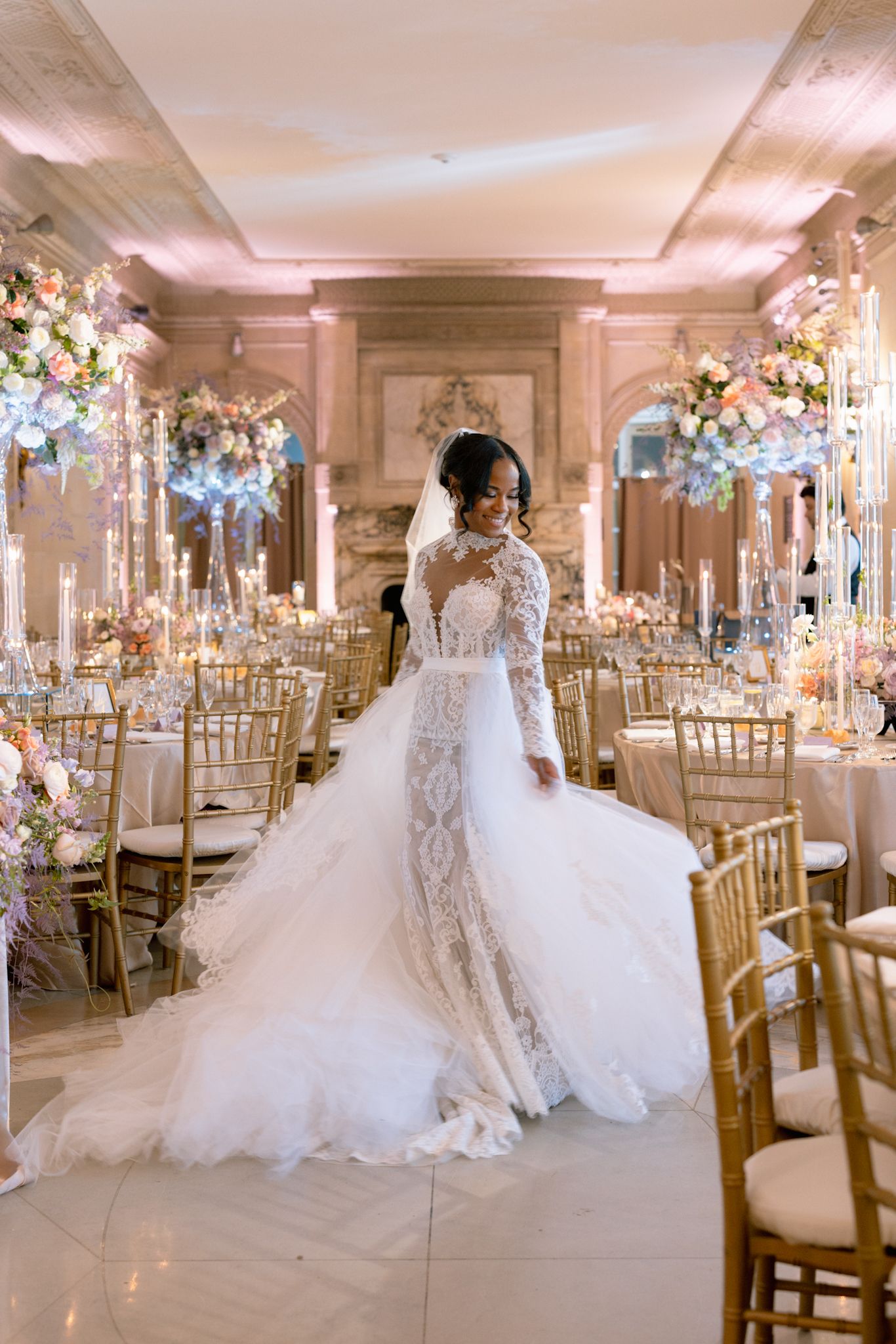 Elegant, editorial-inspired image of bride twirling at historic Armour House, photographed by Chicago wedding photographer specializing in c