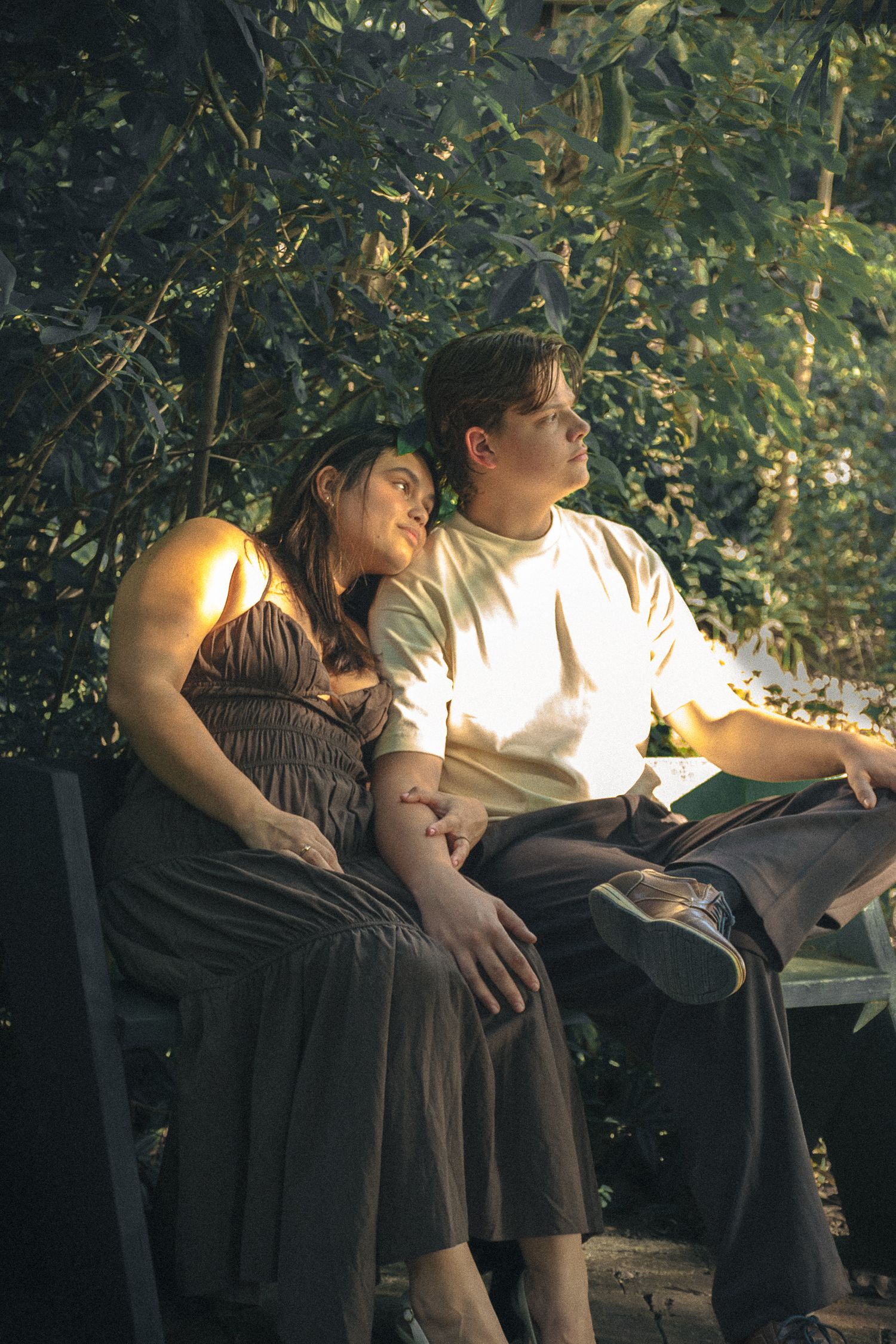 ethereal picture of a couple sitting on a bench