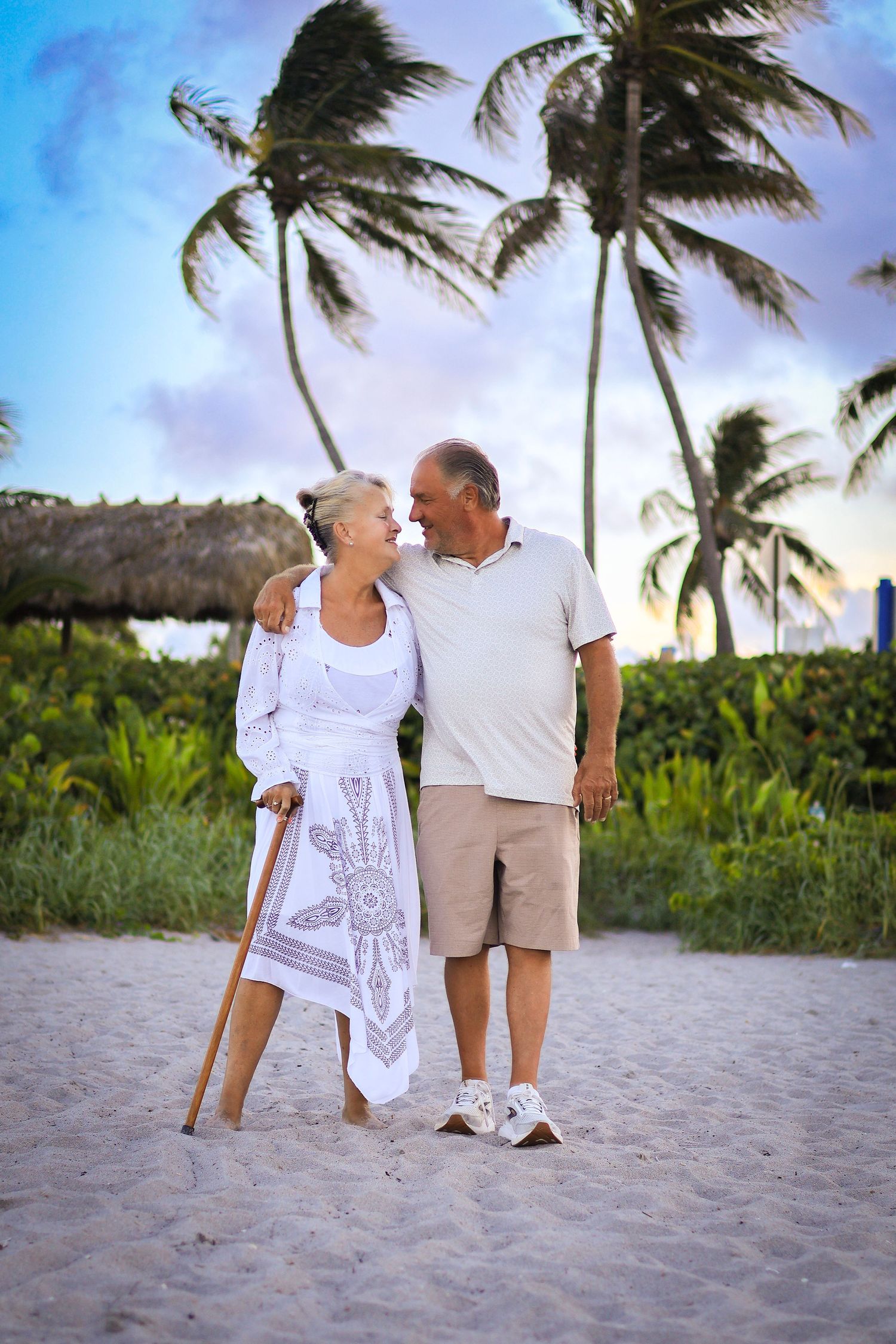 family photography on the beach while looking at eachother