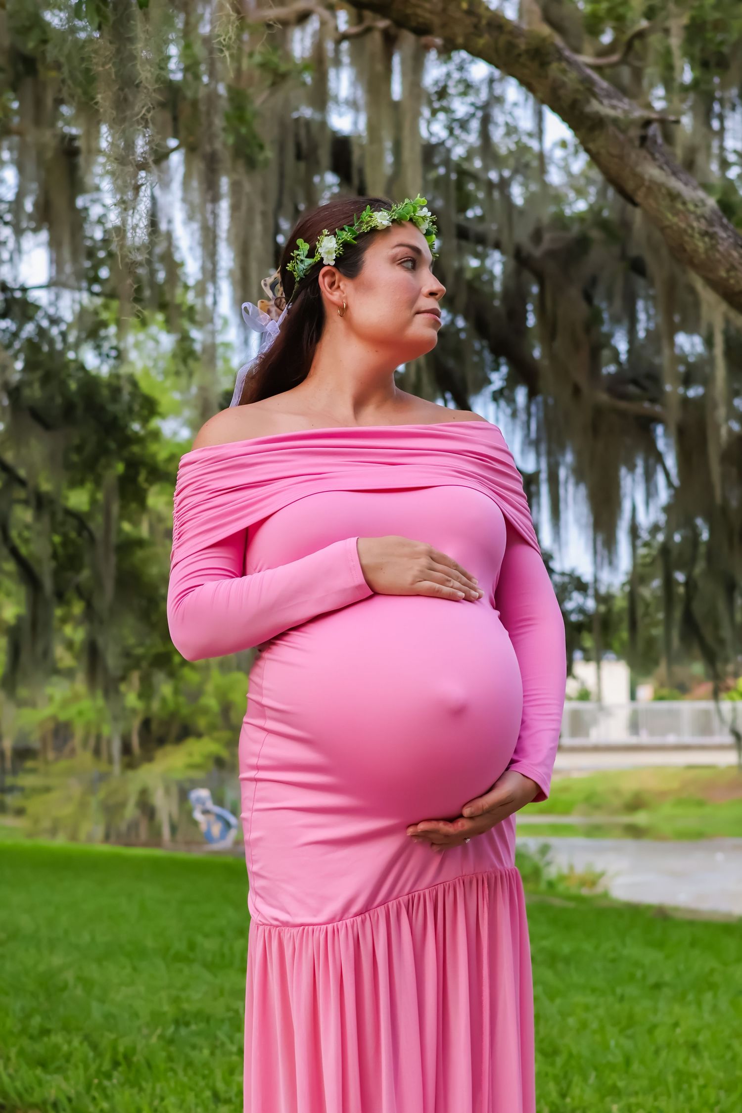 pink maternity dress in nature orlando florida profile picture
